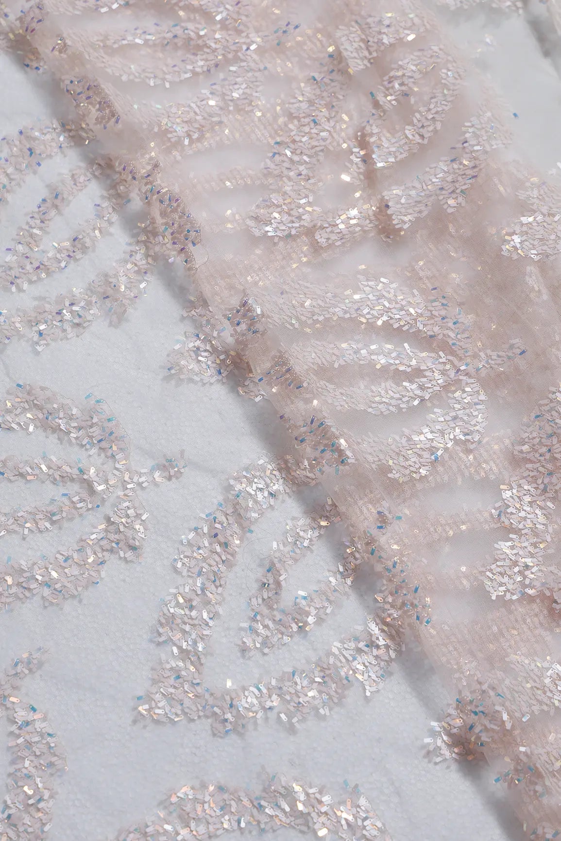 1 Meter Cut Piece Of Oval Sequins Abstract Embroidery Work On Light Pink Soft Net Fabric - doeraa