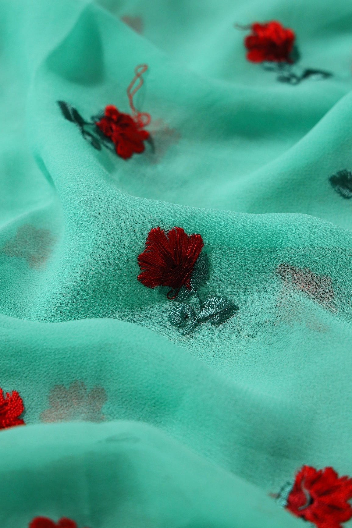 1 Meter Cut Piece Of Red And Green Thread Small Floral Embroidery On Sea Green Georgette Fabric - doeraa