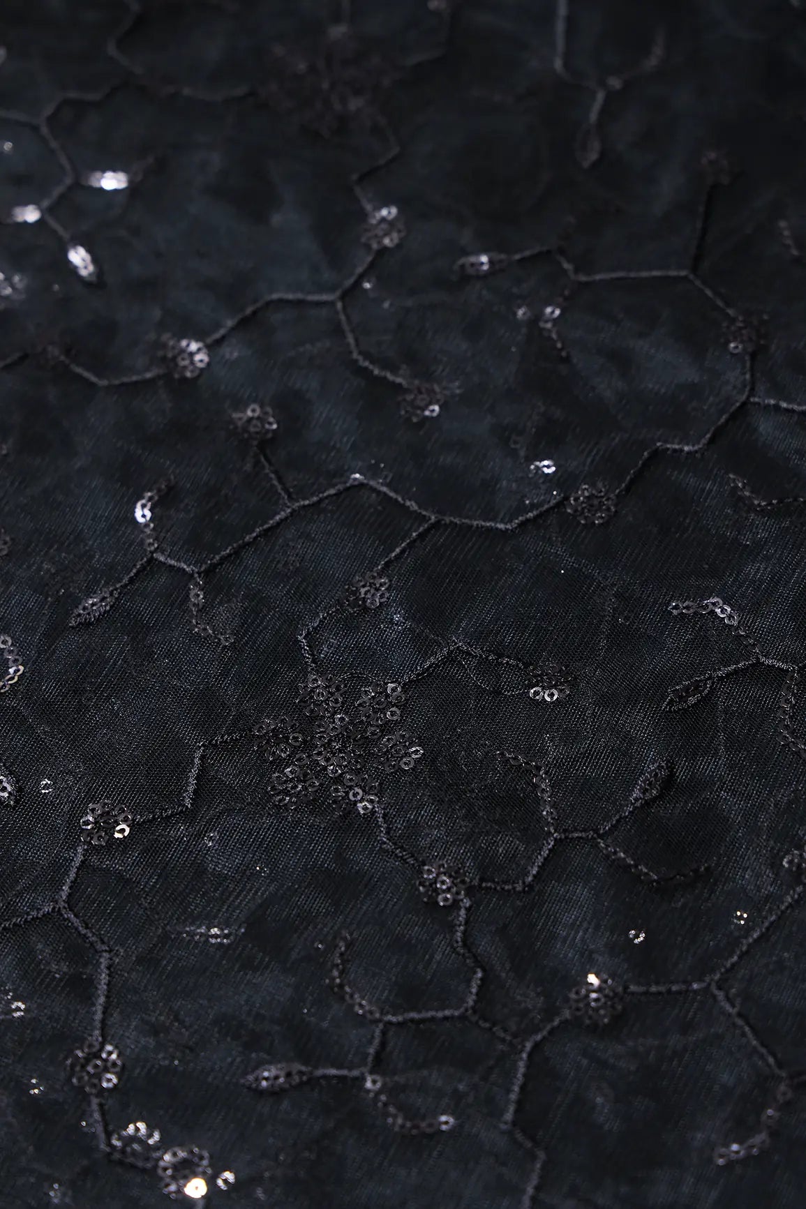 Beautiful Black Sequins Small Floral Embroidery On Black Soft Net Fabric