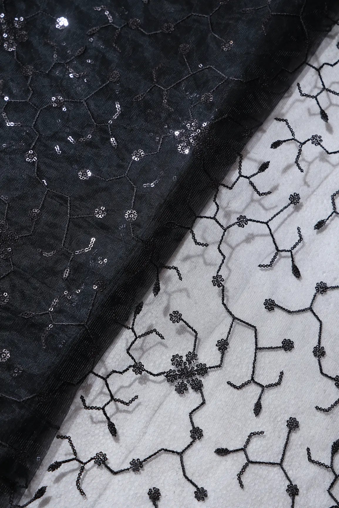 Beautiful Black Sequins Small Floral Embroidery On Black Soft Net Fabric
