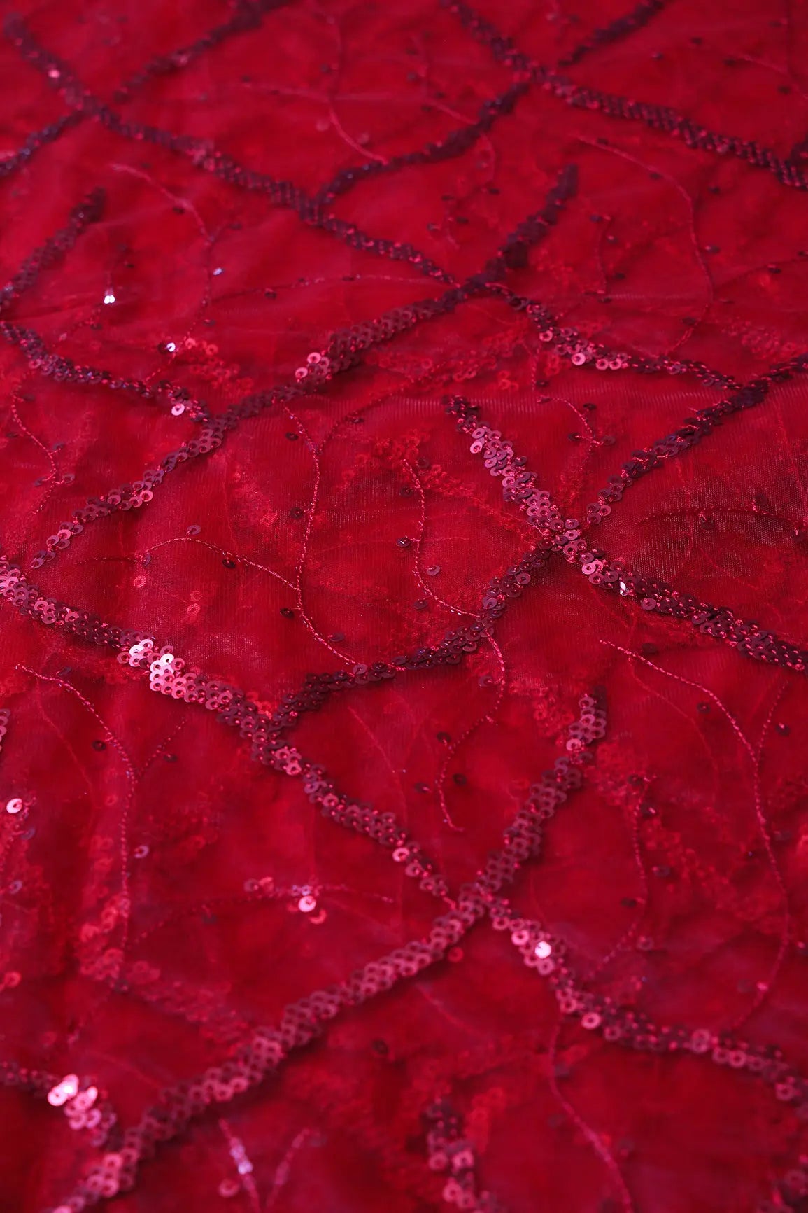 Red Sequins Geometric Embroidery On Red Soft Net Fabric