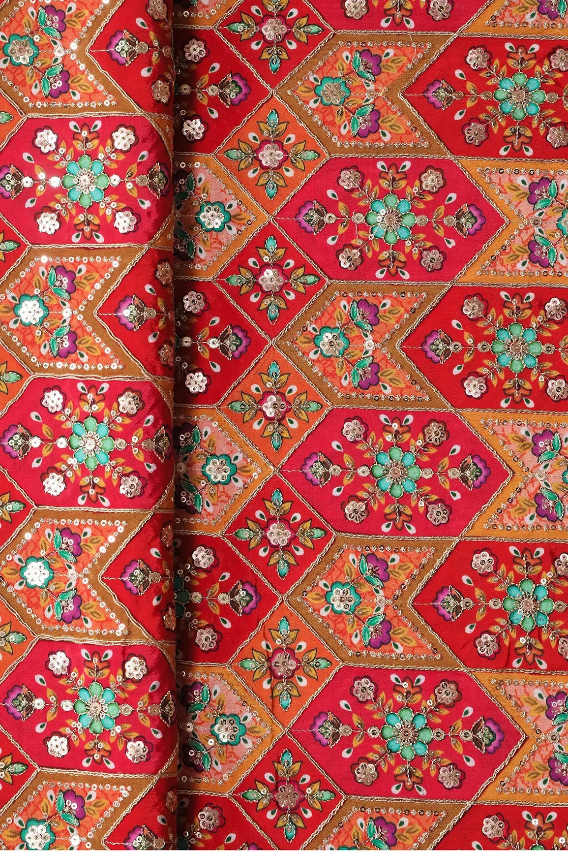 Red And Orange Traditional Positional Print With Gold Zari And Sequins Embroidery On Crepe Fabric