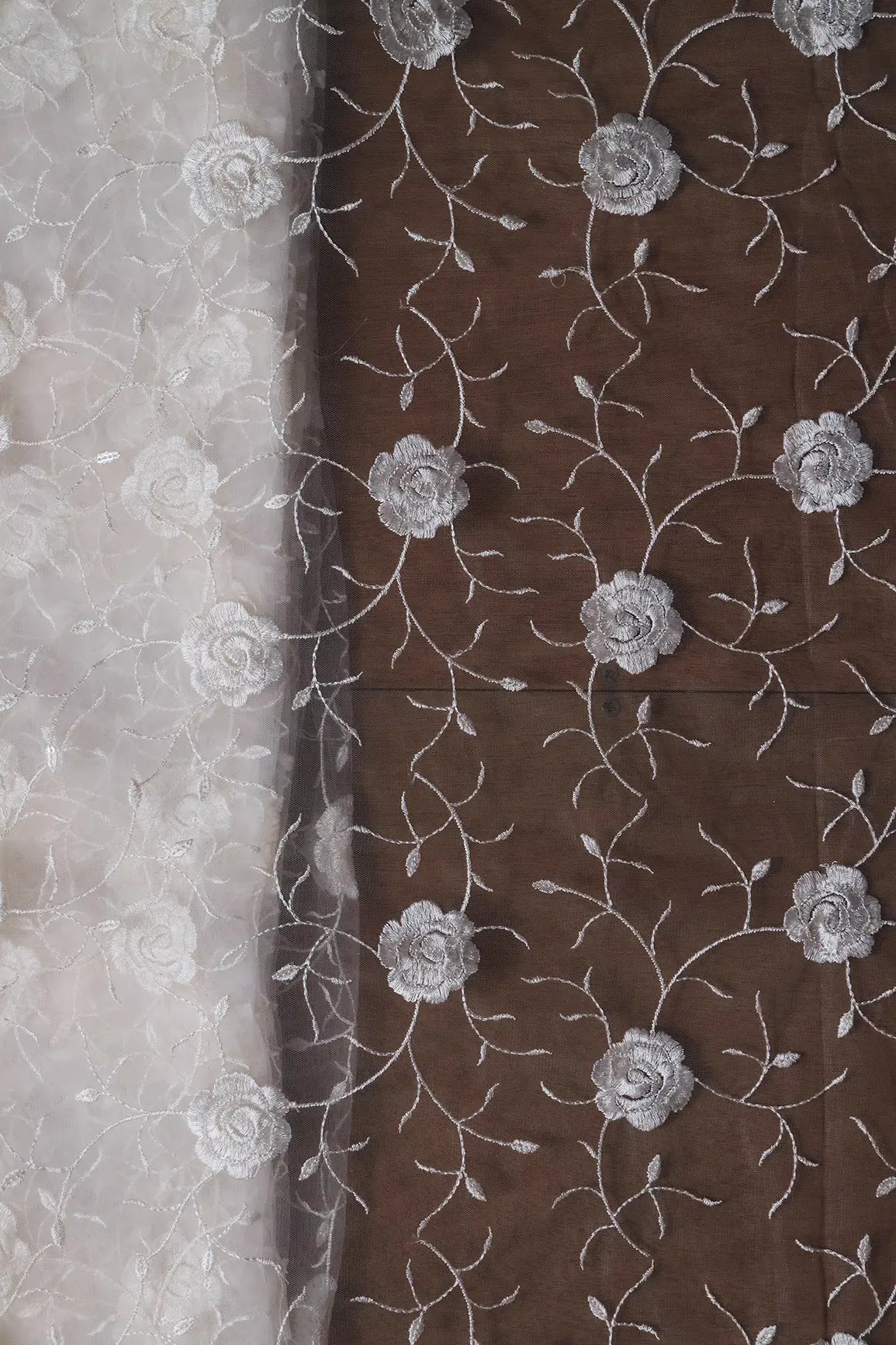 Water Sequins With White Thread Floral Embroidery On White Dyeable Soft Net Fabric