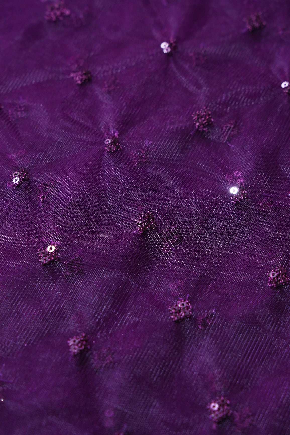 Small Motif Sequins Embroidery Work On Wine Soft Net Fabric