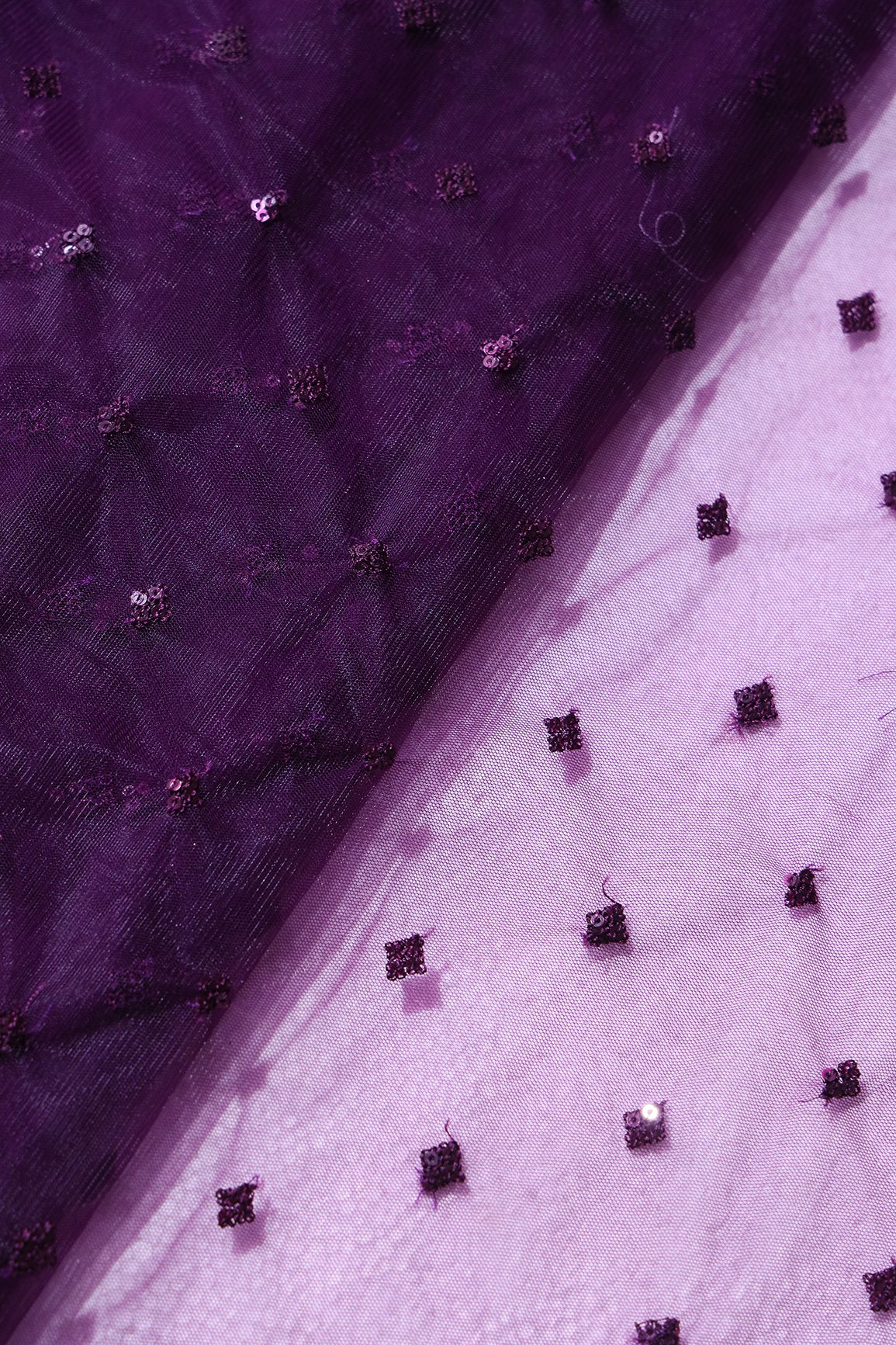 Small Motif Sequins Embroidery Work On Wine Soft Net Fabric