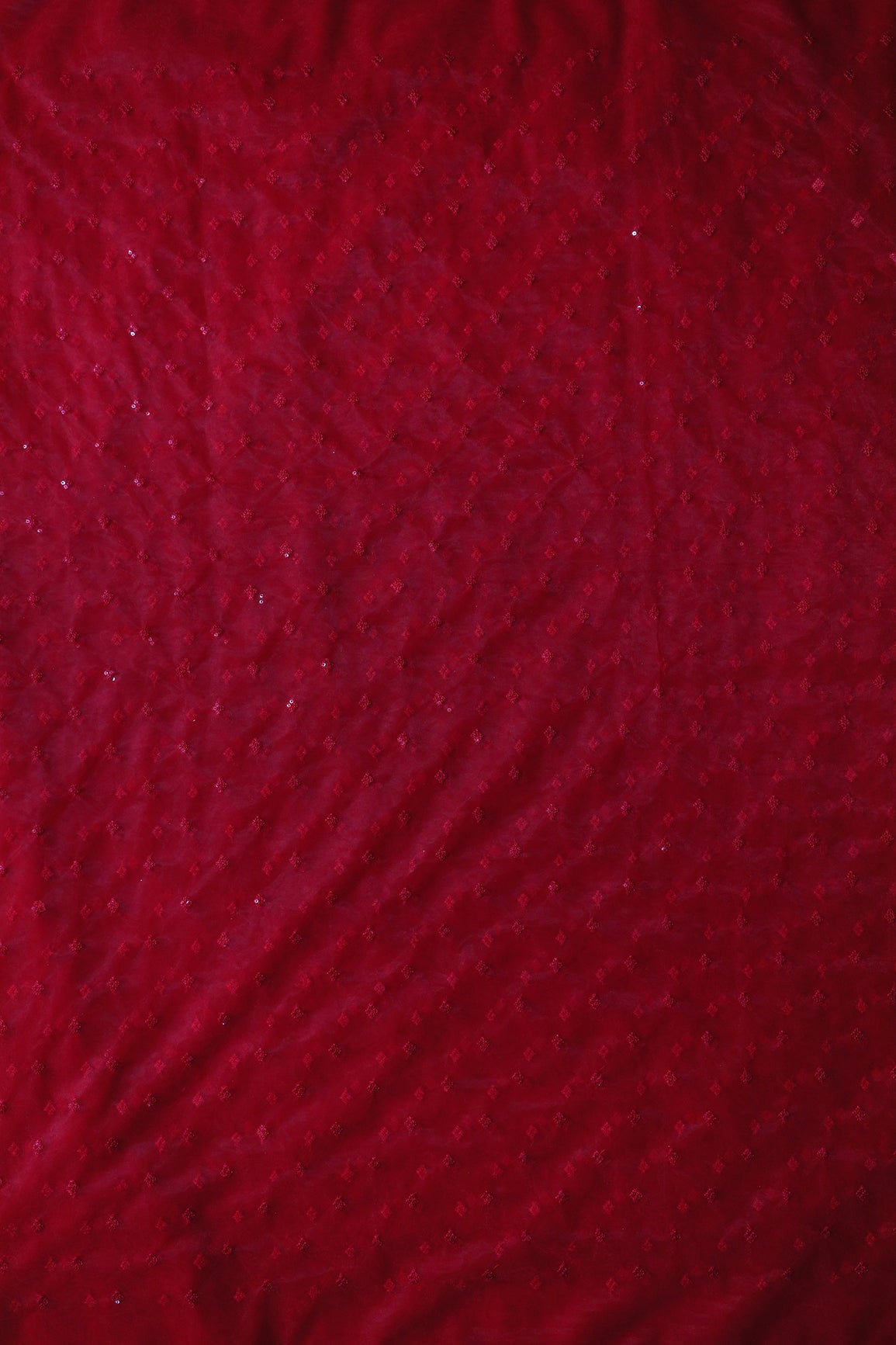 Small Motif Sequins Embroidery Work On Red Soft Net Fabric