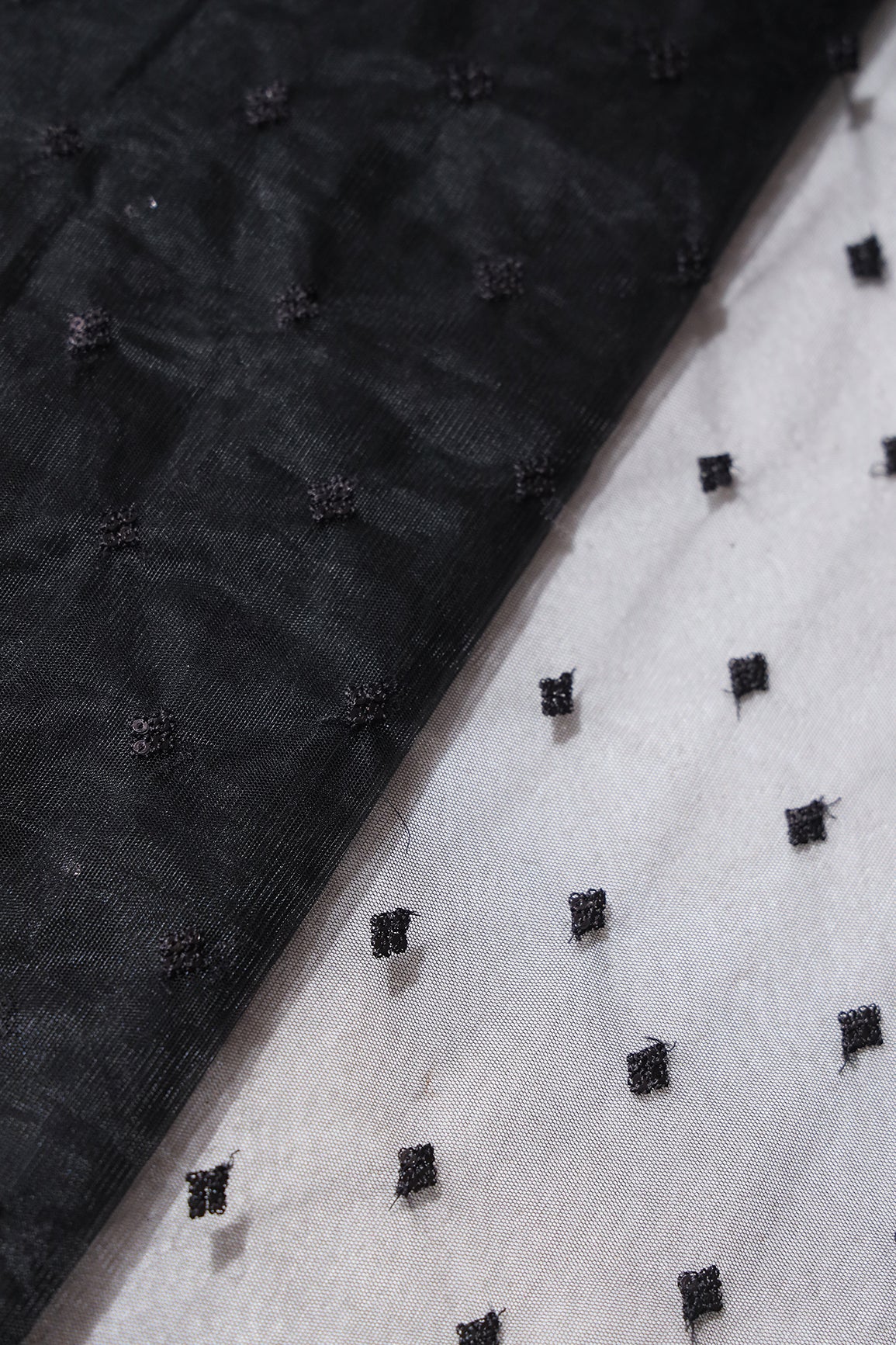 Small Motif Sequins Embroidery Work On Black Soft Net Fabric