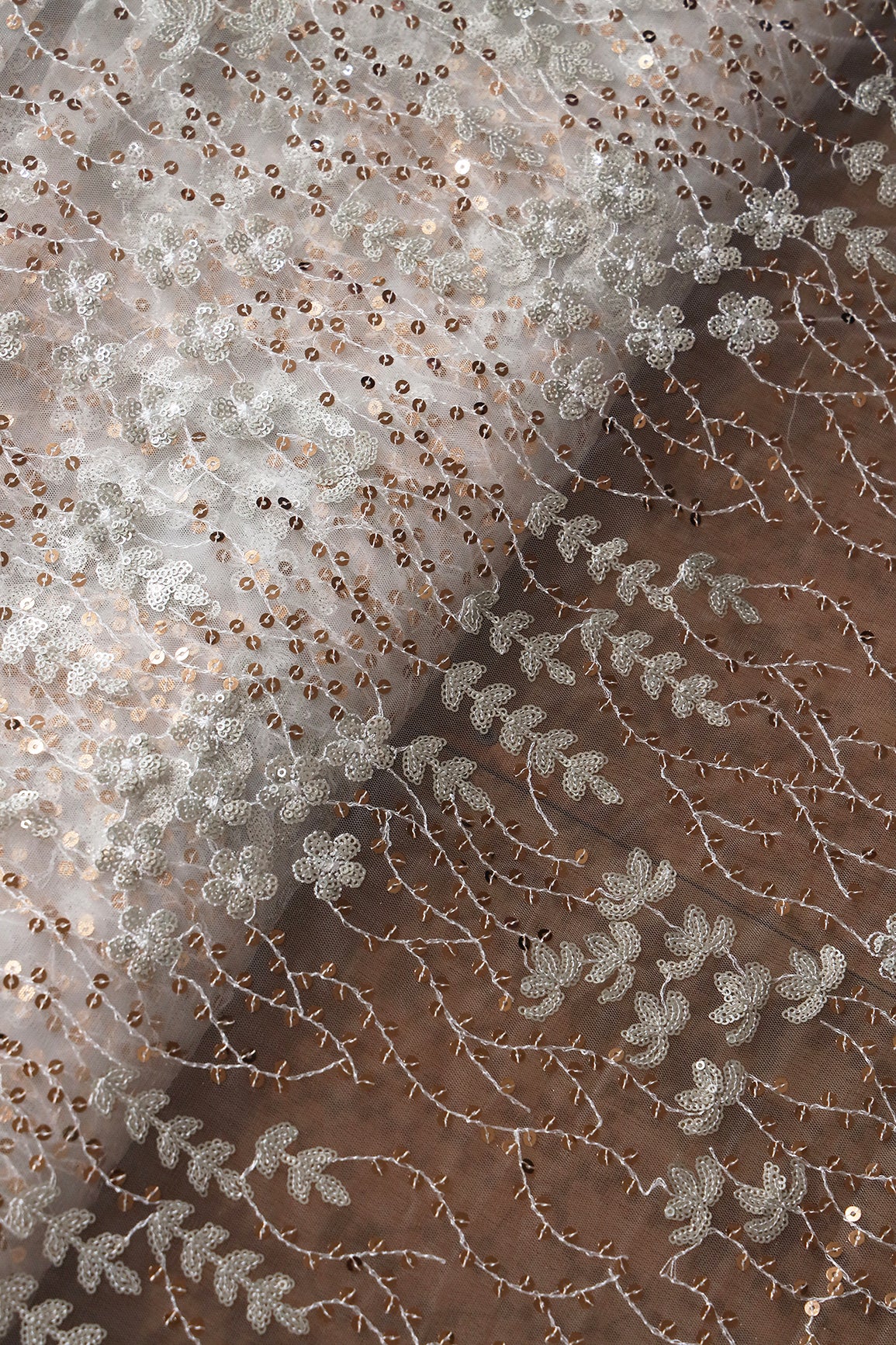 Gold And Silver Sequins Heavy Embroidery On Dyeable White Soft Net Fabric