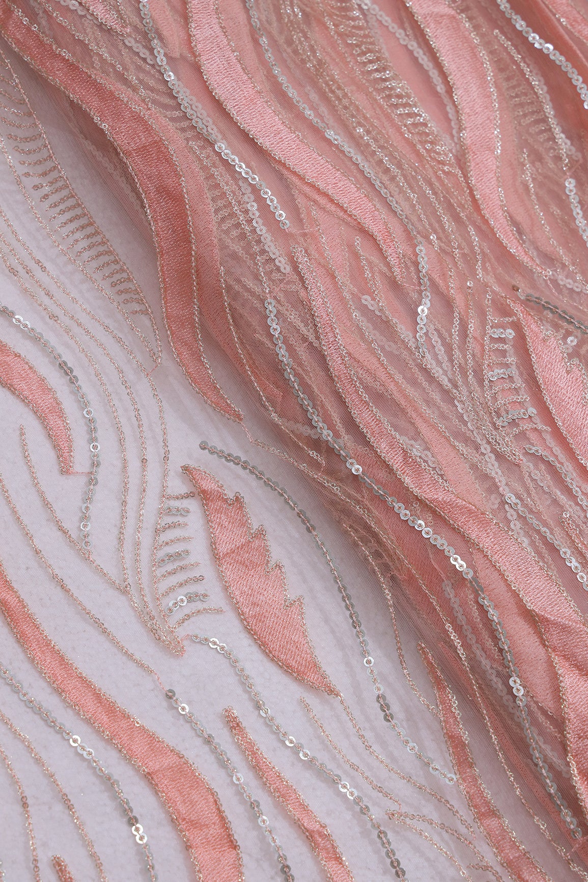 Peach Thread With Sequins Wavy Embroidery Work On Peach Soft Net Fabric
