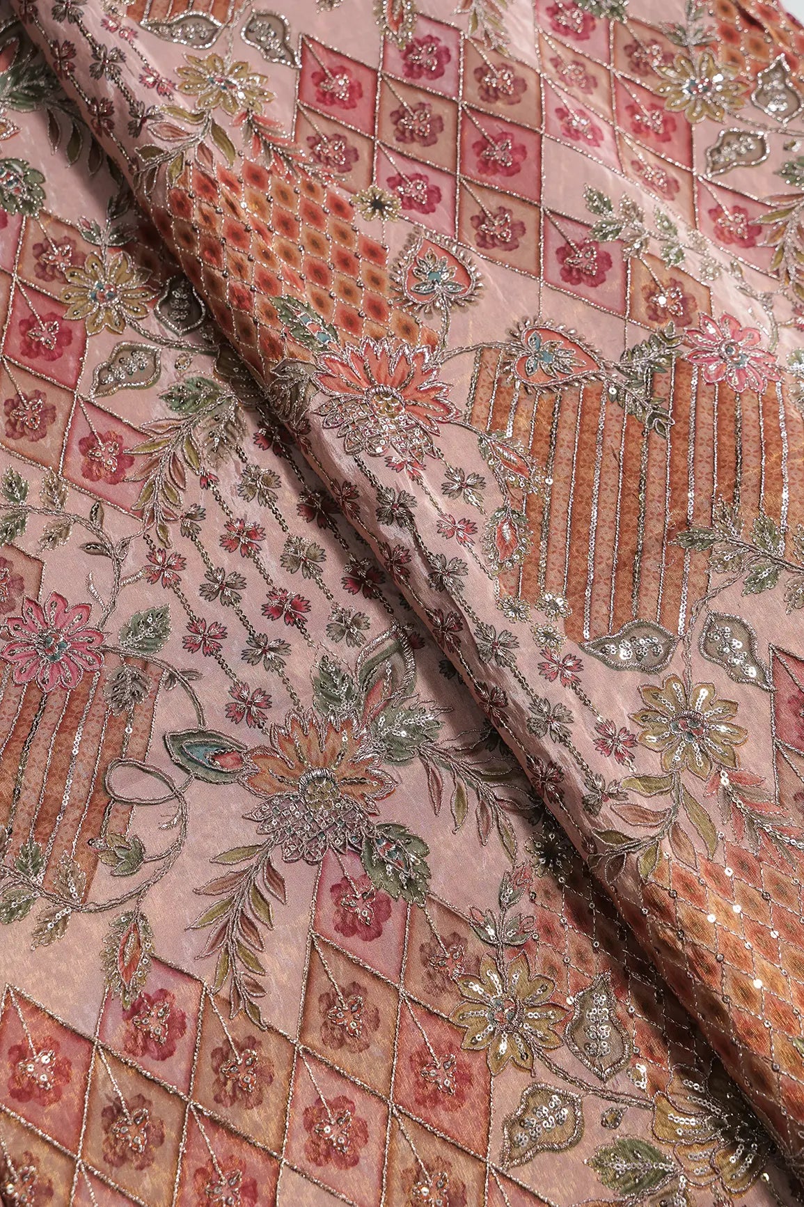 Floral Positional Print On Sequins With Zari Embroidery Work On Peach Viscose Zari Tissue Fabric