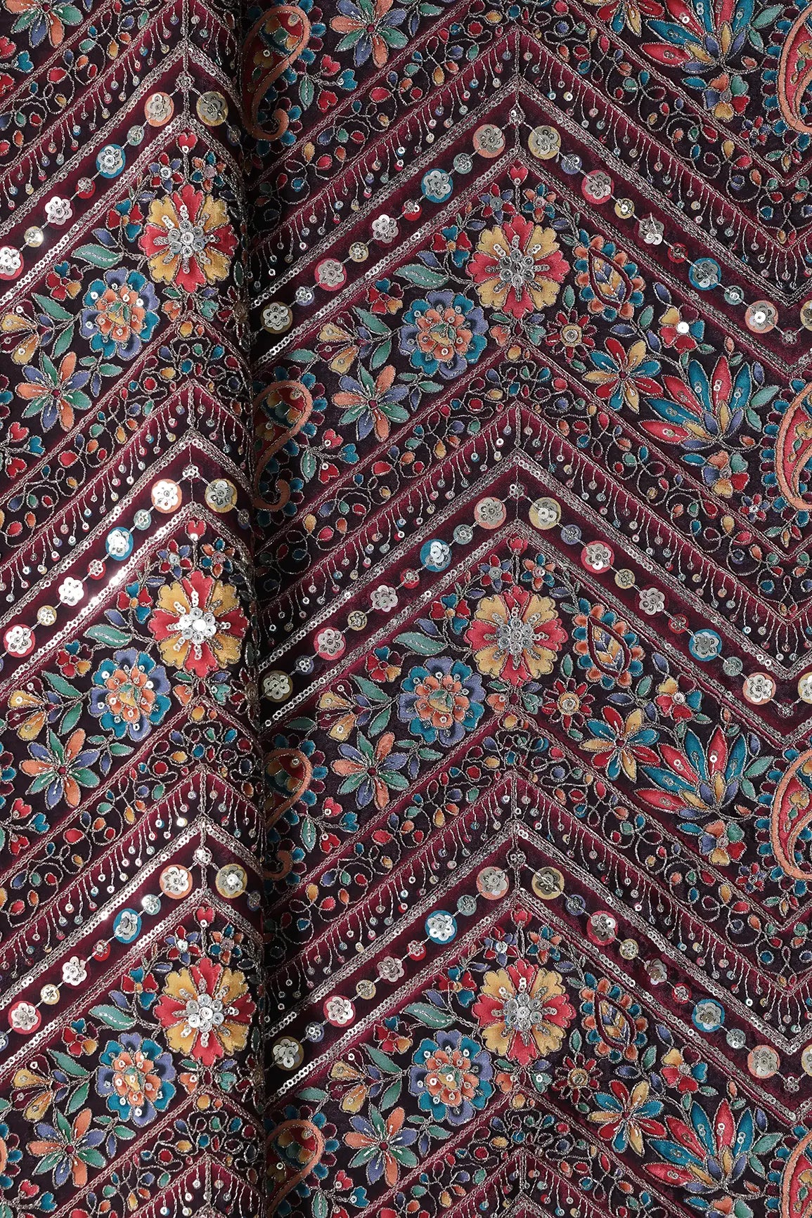 Zari & Sequins With Multi Color Chevron Print Heavy Embroidery Work On Maroon Pure Crepe Fabric