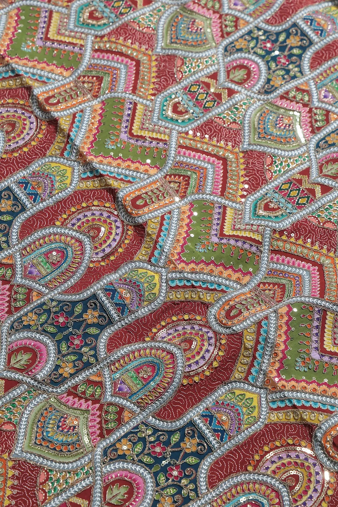 Zari & Sequins With Multi Color Geometric Print Heavy Embroidery Work On Maroon Pure Crepe Fabric