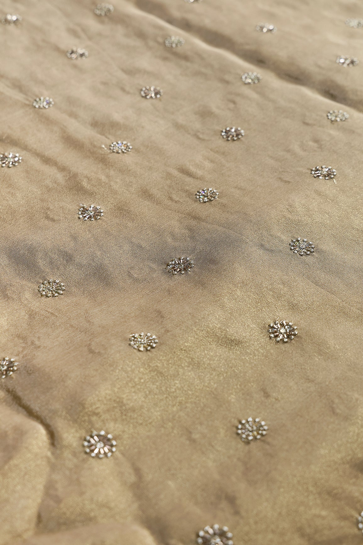 Multi Sequins & Beads With Zari Floral Butti Embroidery Work On Beige Viscose Zari Tissue Fabric