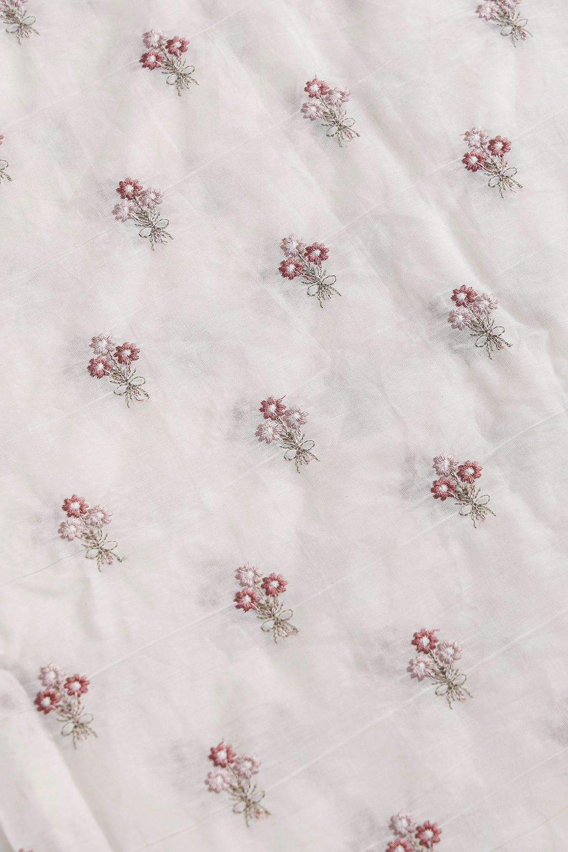 Mauve And Onion Pink Thread Small Floral Embroidery Work On Off White Organic Cotton Fabric