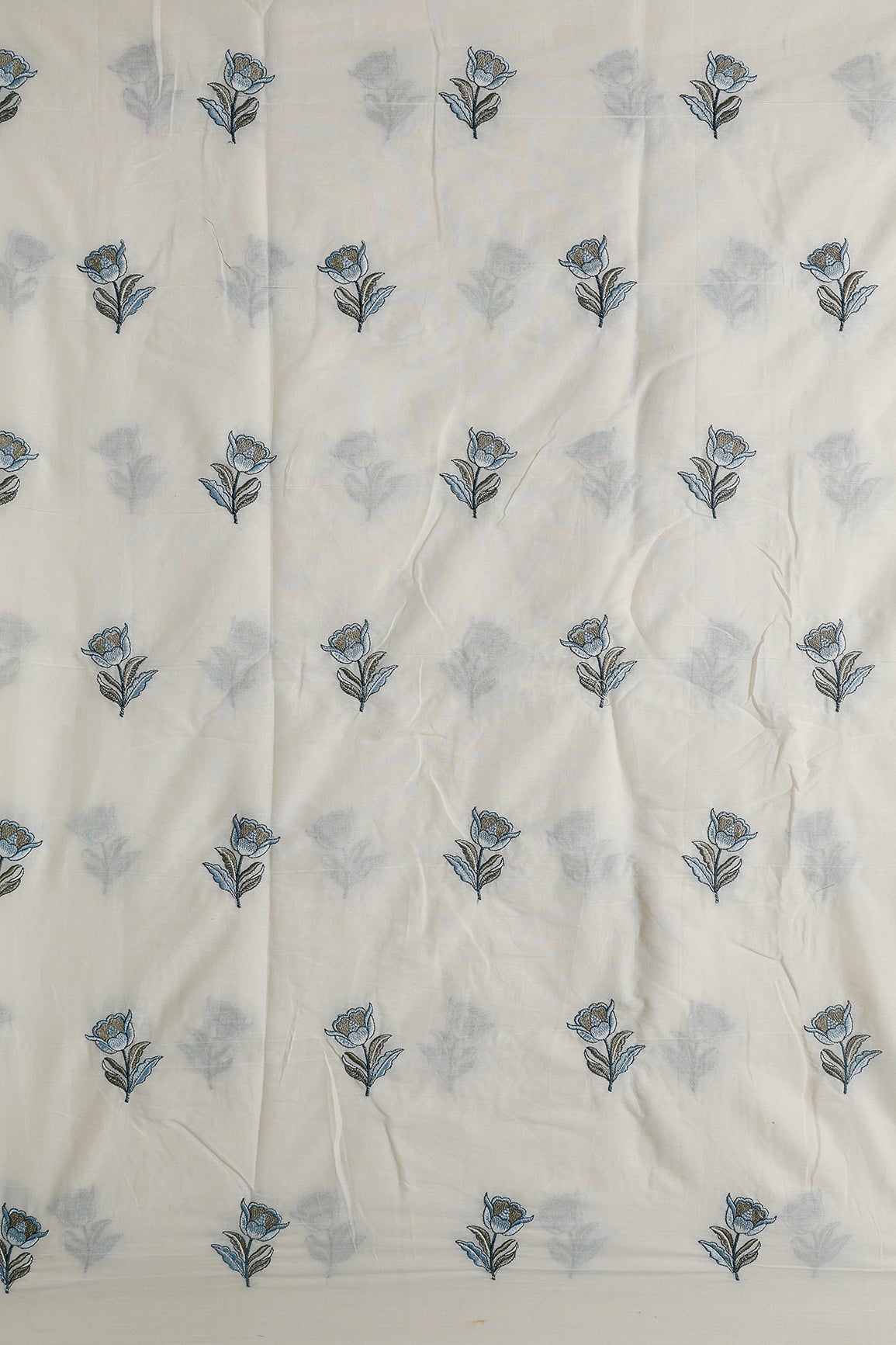 Blue And Olive Thread Beautiful Floral Embroidery Work On Off White Organic Cotton Fabric