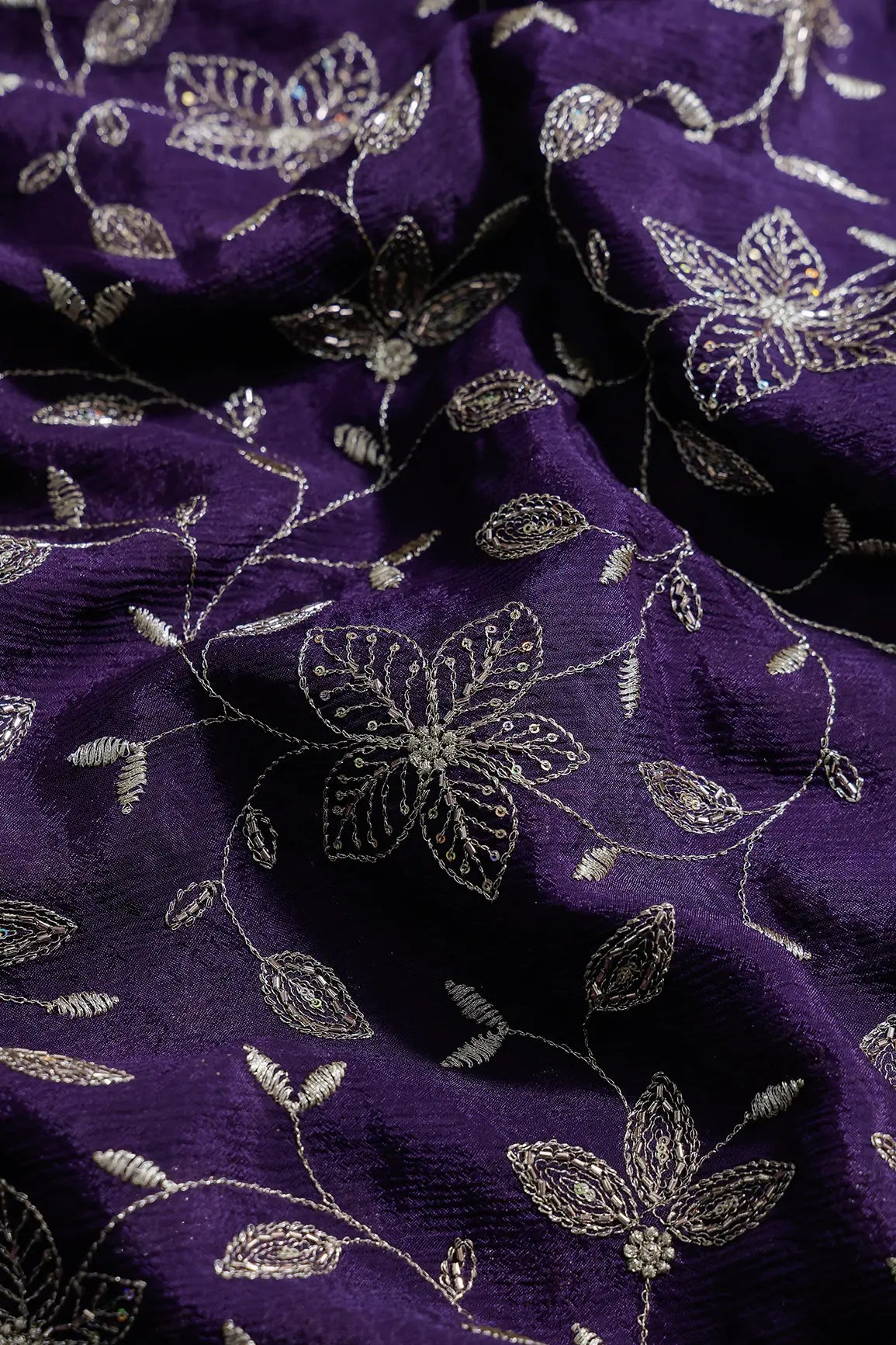 Multi Sequins & Beads With Zari Floral Leafy Embroidery Work On Dark Purple Chinnon Chiffon Fabric