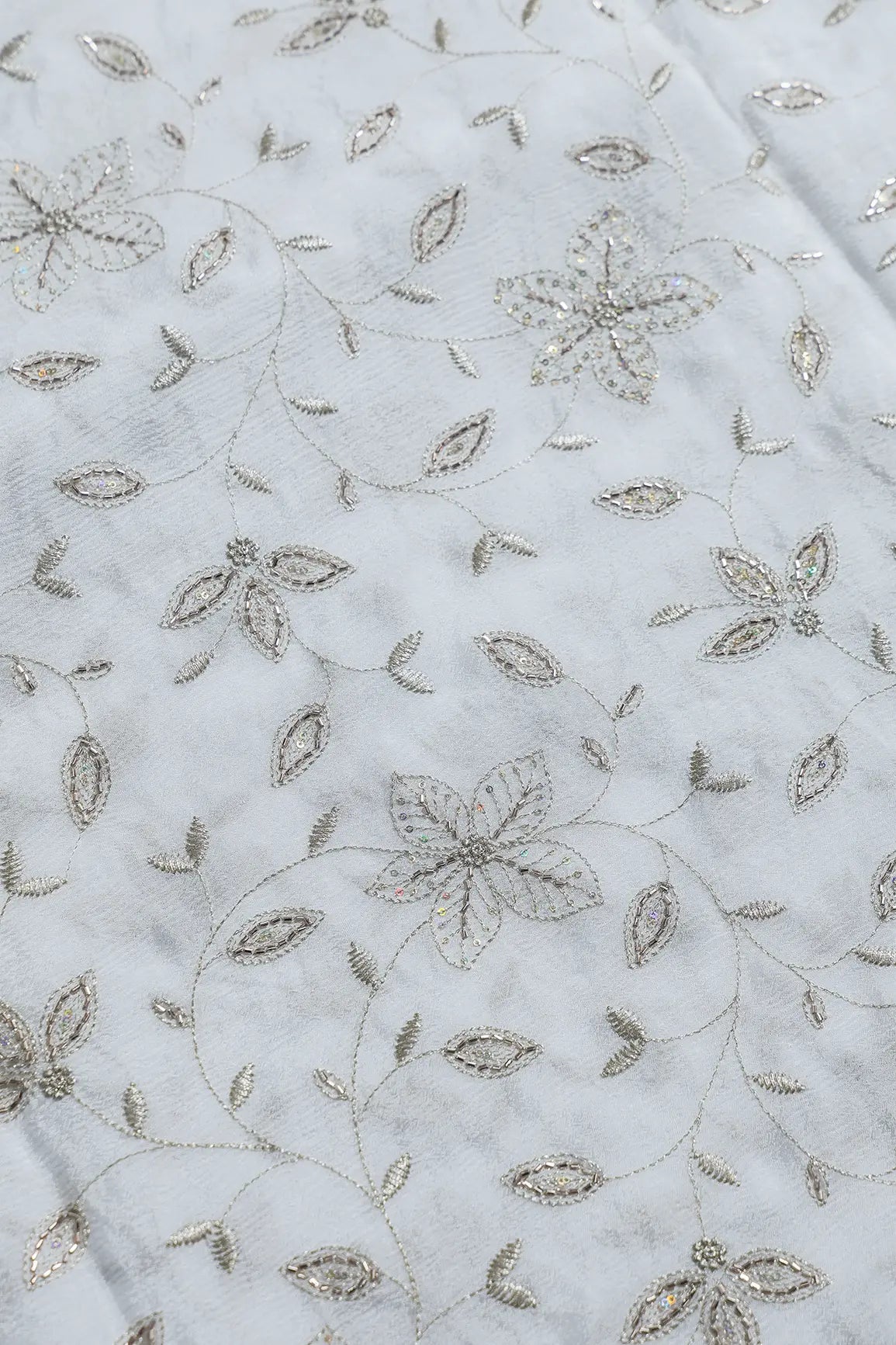 Multi Sequins & Beads With Zari Floral Leafy Embroidery Work On Dyeable White Chinnon Chiffon Fabric