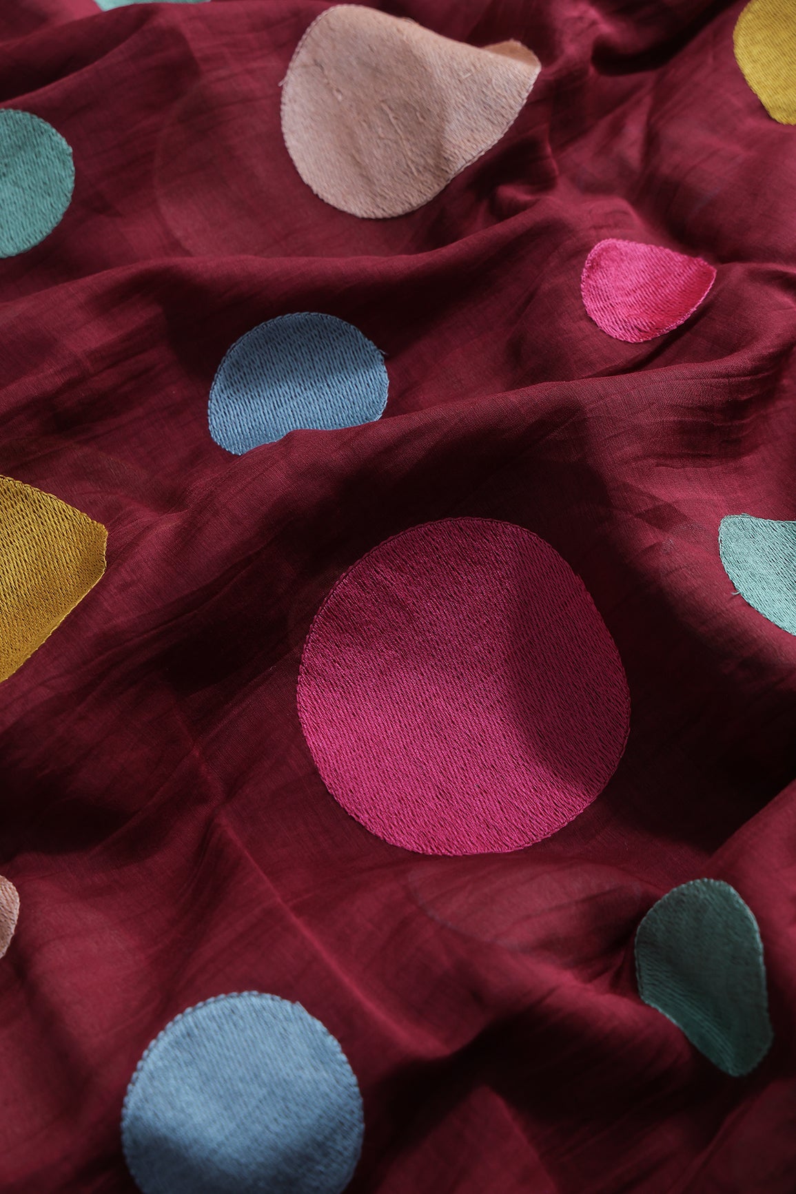 Multi Thread Circle Embroidery On Maroon Pure Mul Chanderi Silk Fabric