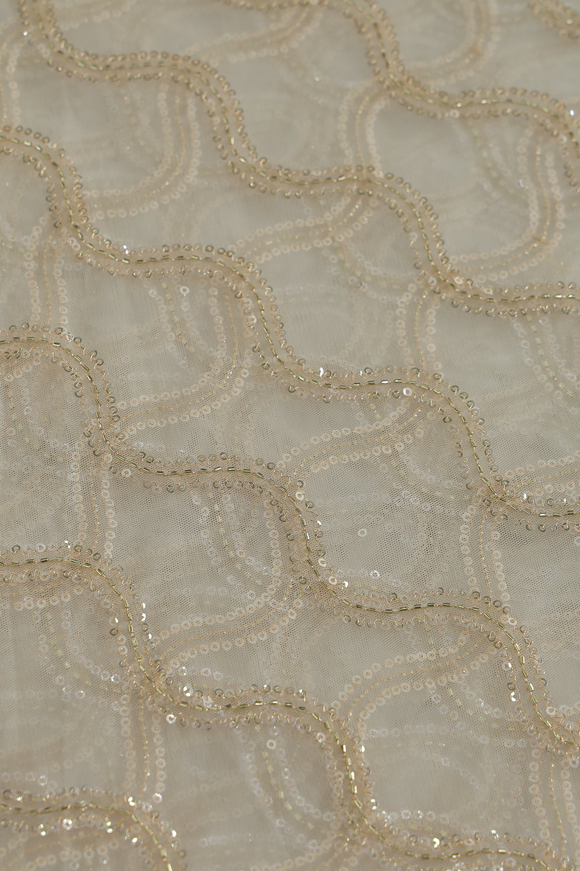 Leheriya Embroidery Work With Sequins And Beads On Cream Soft Net Fabric