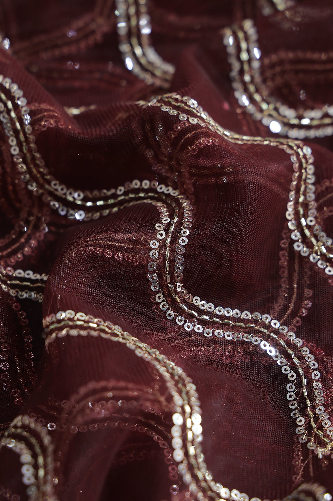 Leheriya Embroidery Work With Sequins And Beads On Maroon Soft Net Fabric