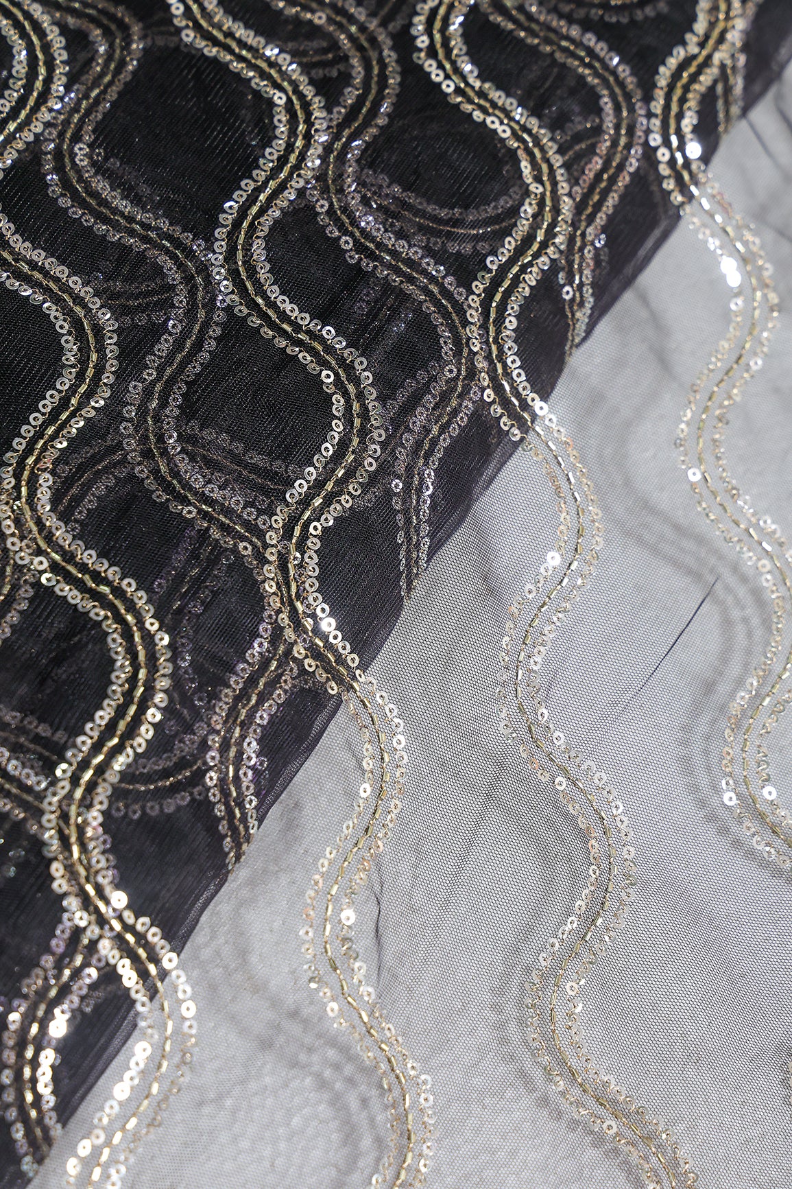 Leheriya Embroidery Work With Sequins And Beads On Black Soft Net Fabric