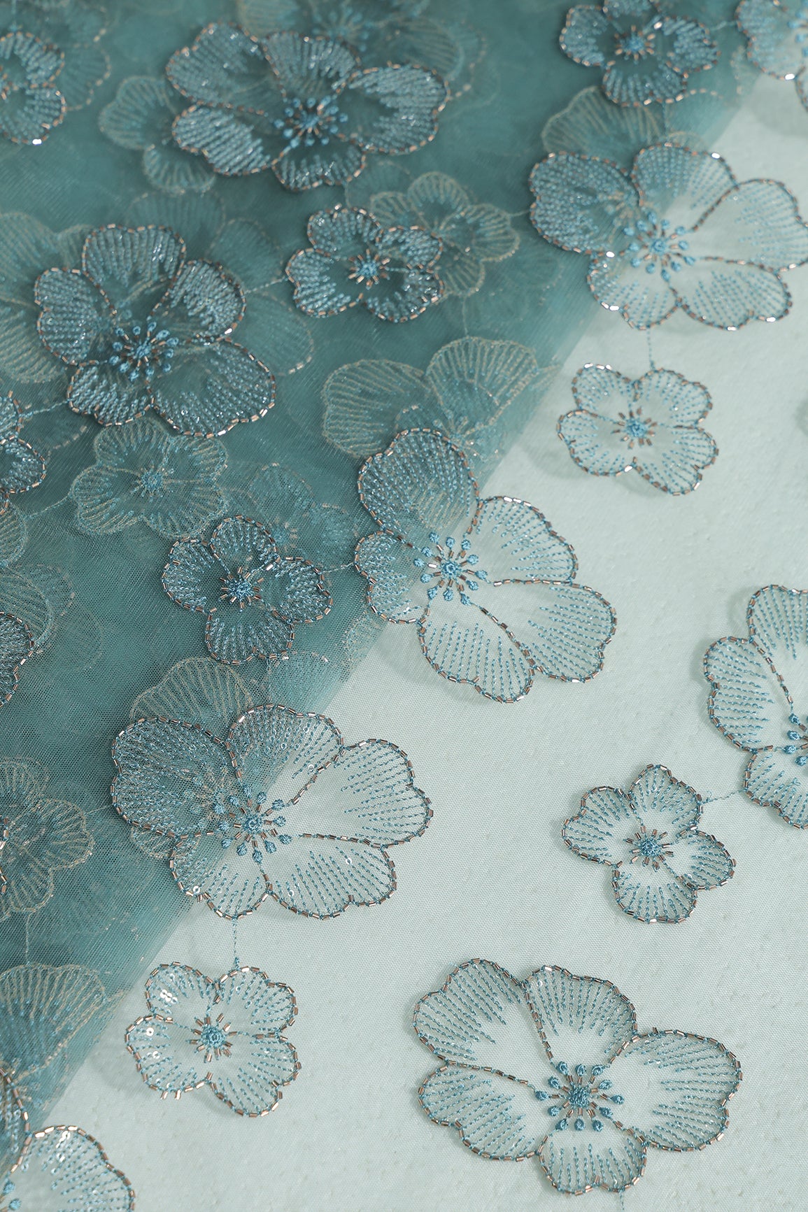 Floral Water Sequins Tone To Tone Embroidery On Teal Soft Net Fabric
