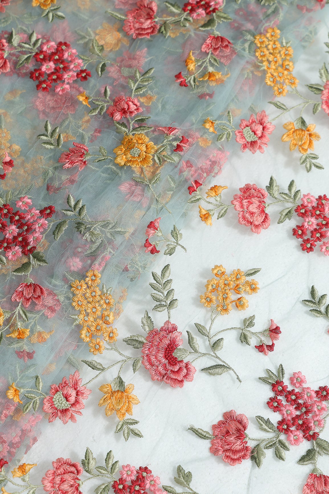 Multi Colour Floral Thread Embroidery Work On Sky Blue Soft Net Fabric