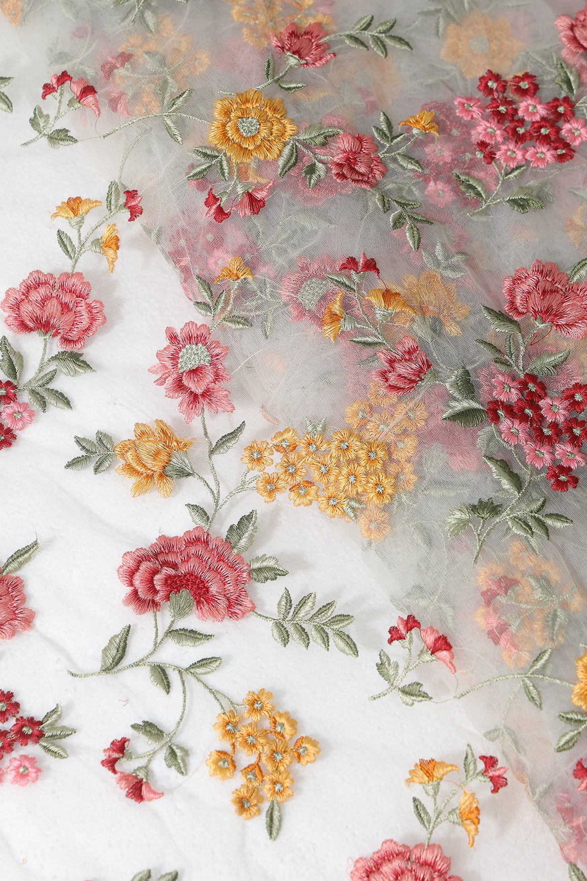 Multi Colour Floral Thread Embroidery Work On White Soft Net Fabric