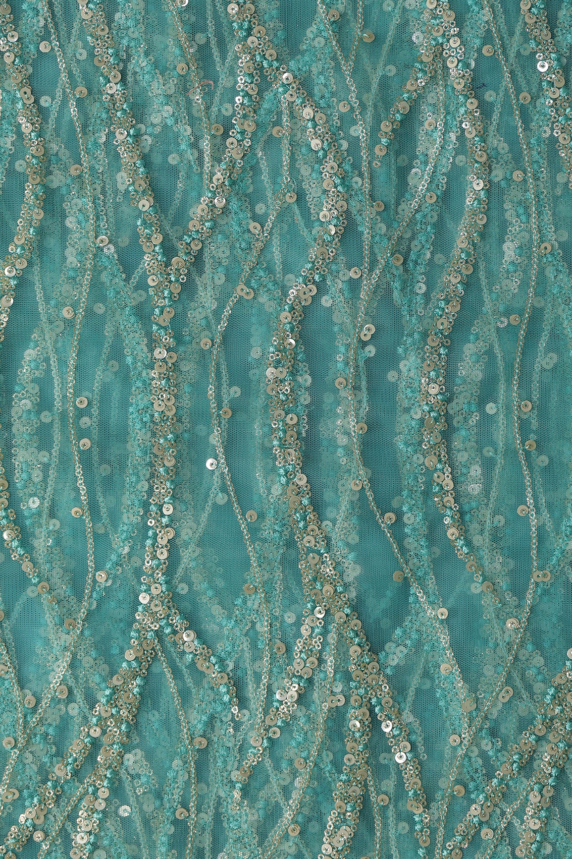 Gold And Silver Sequins With Teal Thread Wavy Embroidery Work On Teal Soft Net Fabric