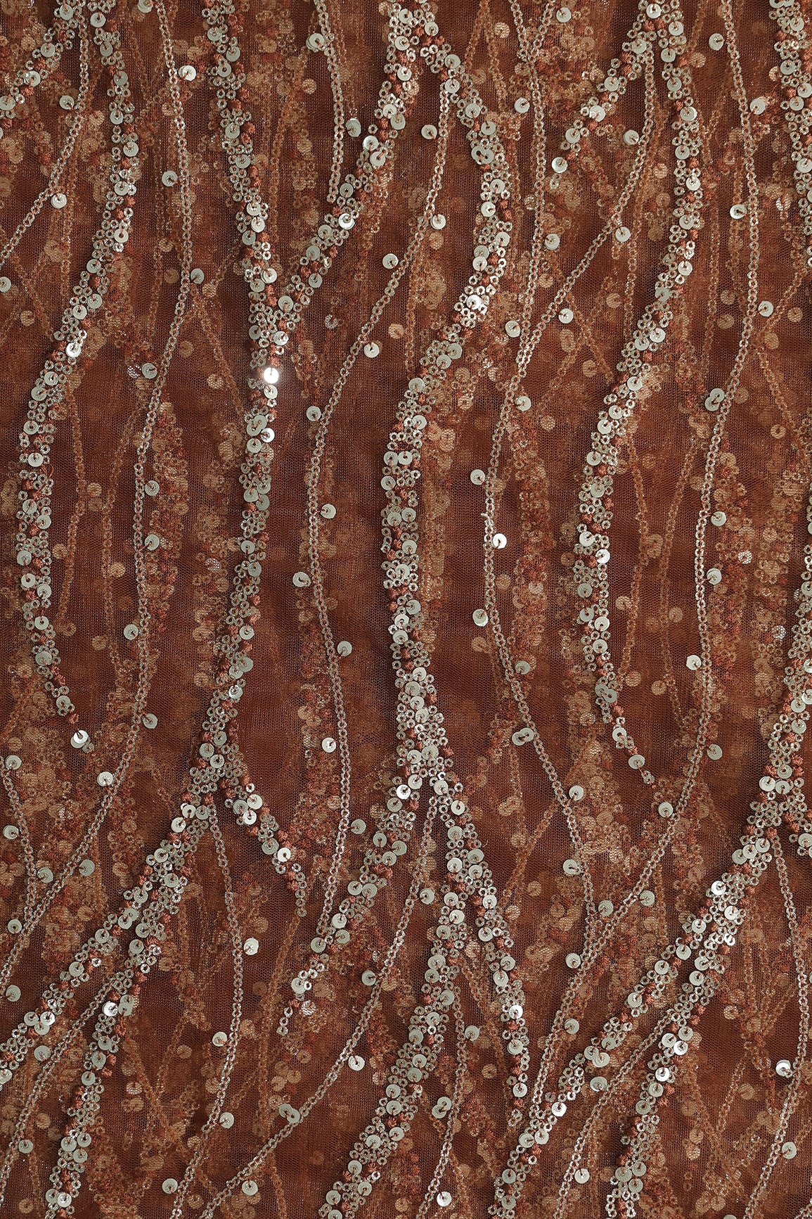 Gold And Silver Sequins With Brown Thread Wavy Embroidery Work On Brown Soft Net Fabric