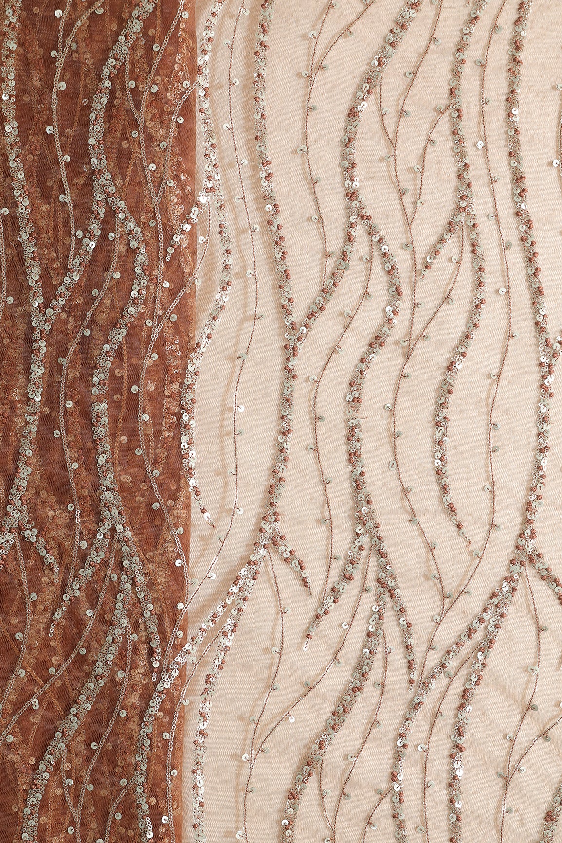 Gold And Silver Sequins With Brown Thread Wavy Embroidery Work On Brown Soft Net Fabric