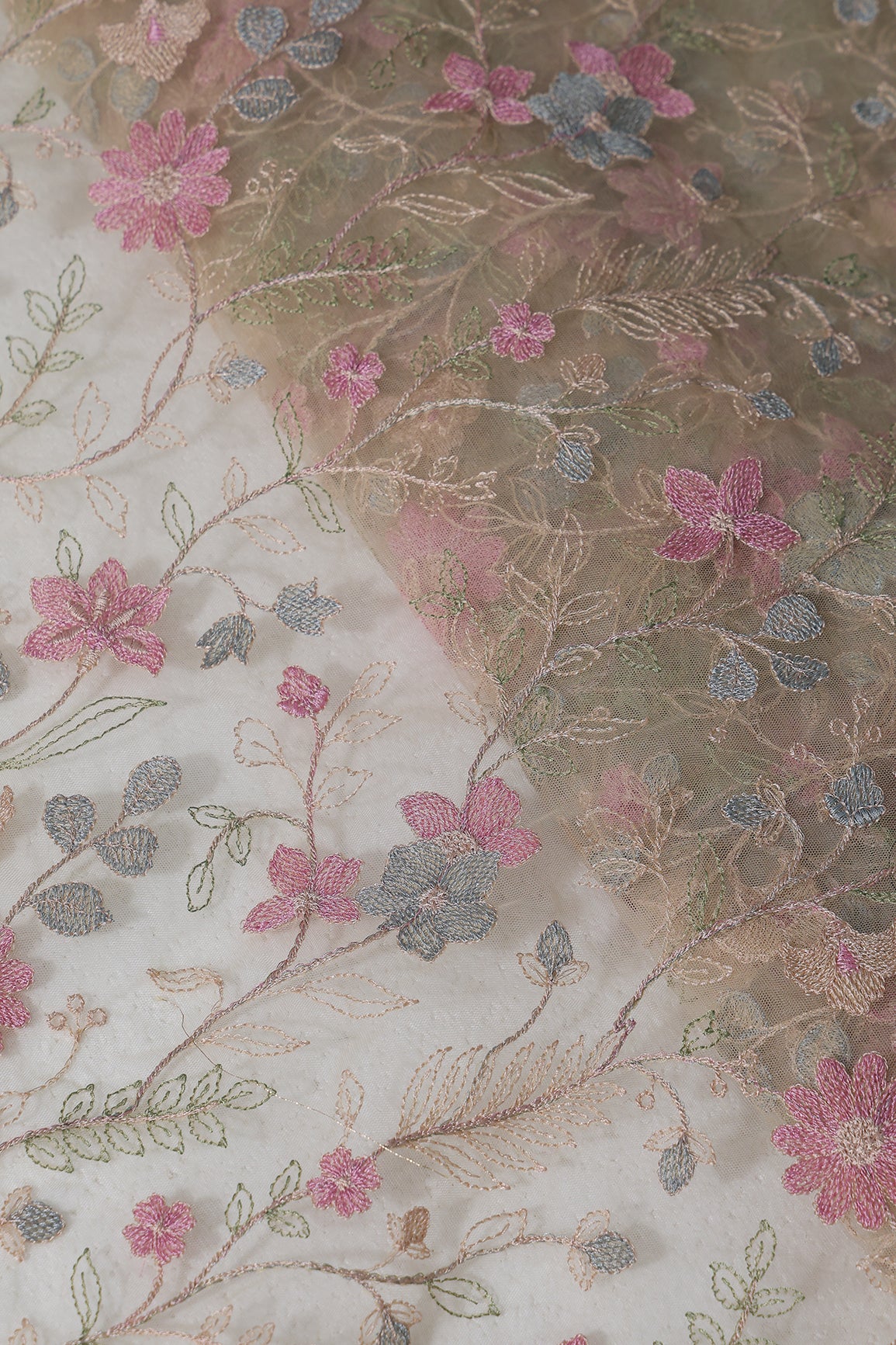 Multi Colour Floral Thread Embroidery Work On Beige Soft Net Fabric