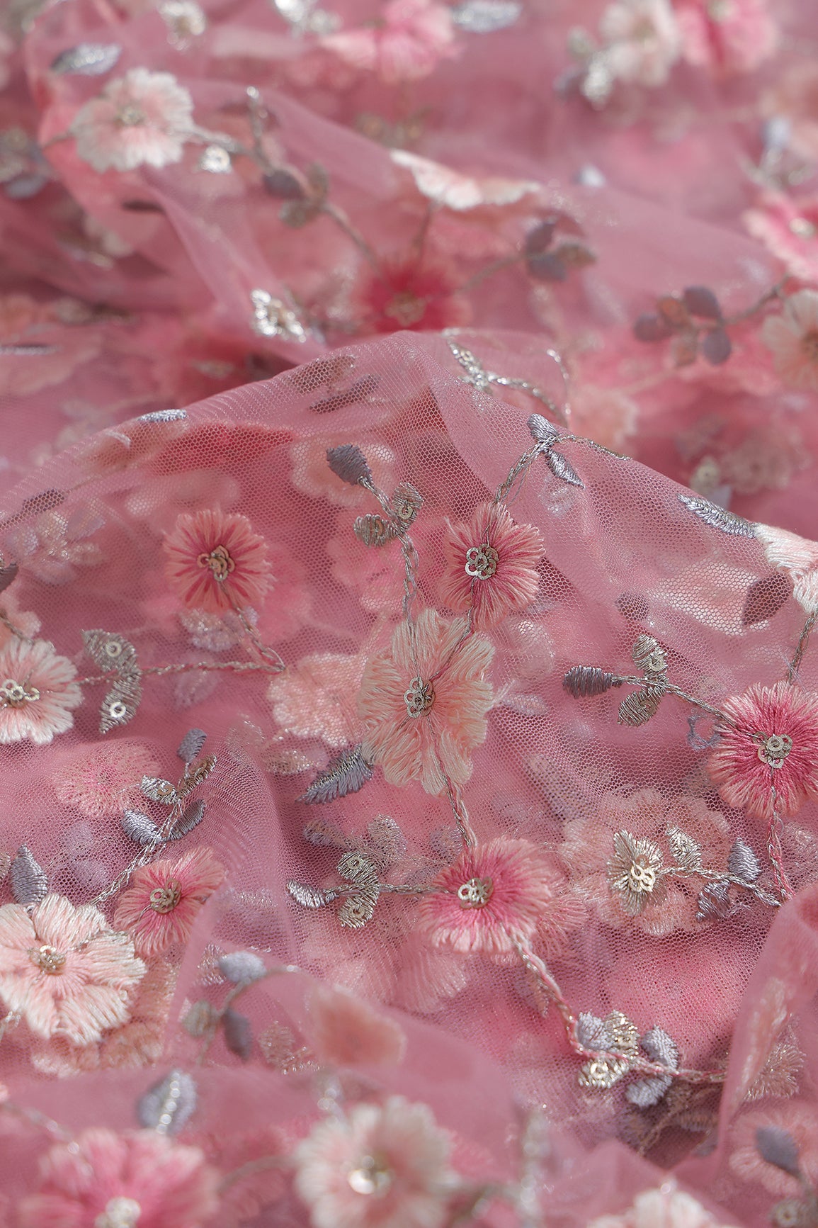 Pink And Cream Thread With Gold Sequins Floral Embroidery On Pink Soft Net Fabric