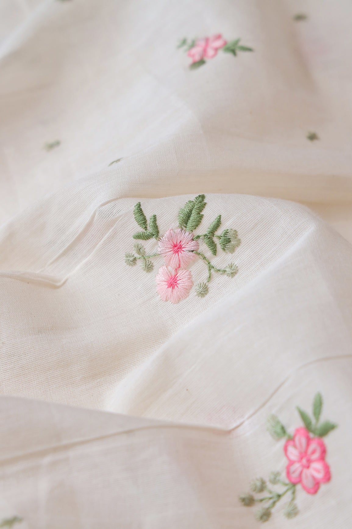 Pink And Olive Thread Small Floral Embroidery On Off White Organic Cotton Fabric