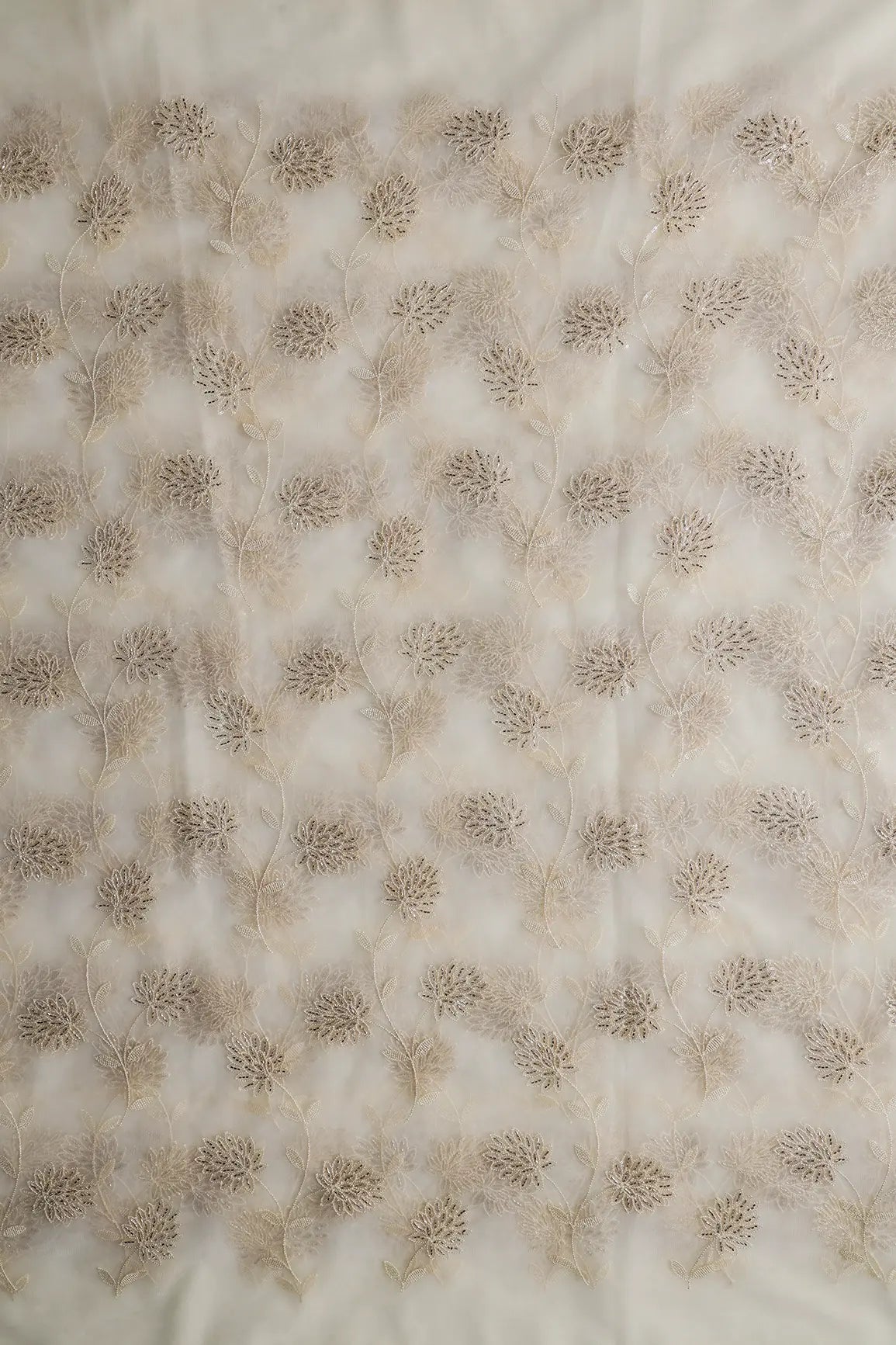 Off White Thread & Gold Beads With Water Sequins Floral Embroidery On Off White Soft Net Fabric