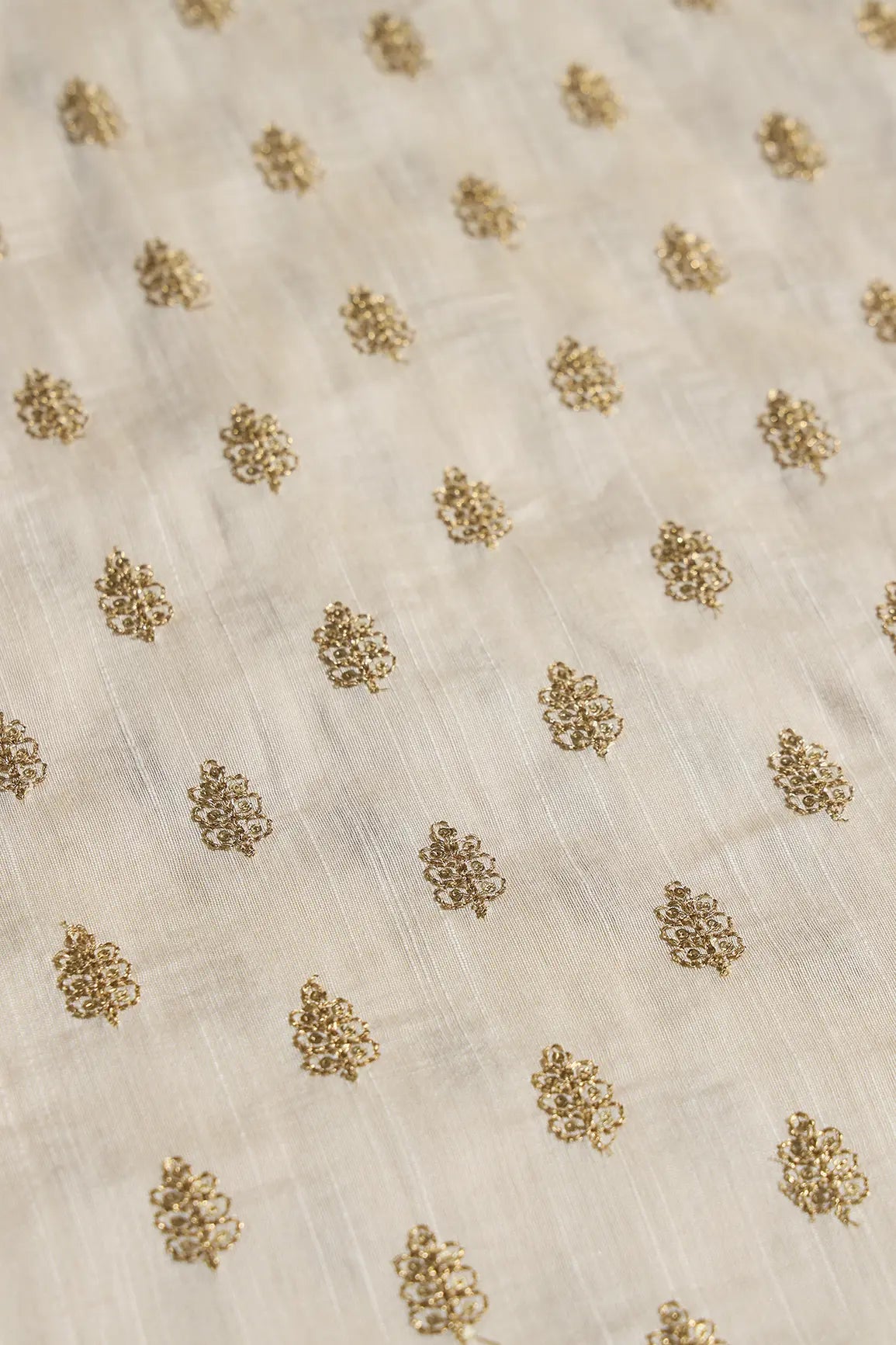 Gold Sequins With Gold Zari Small Motif Embroidery Work On Cream Raw Silk Fabric