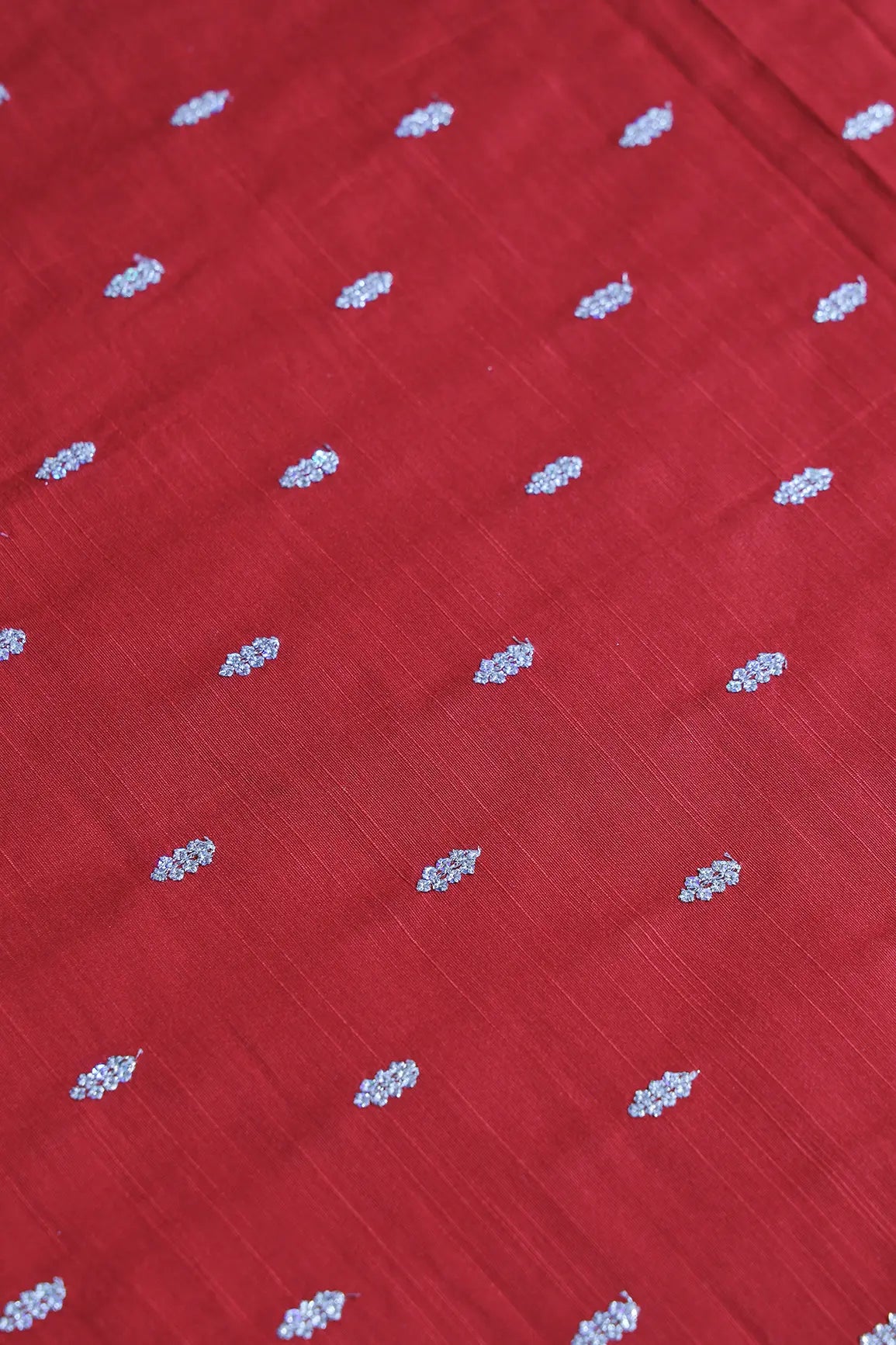 Silver Sequins With Gold Zari Small Motif Embroidery Work On Red Raw Silk Fabric