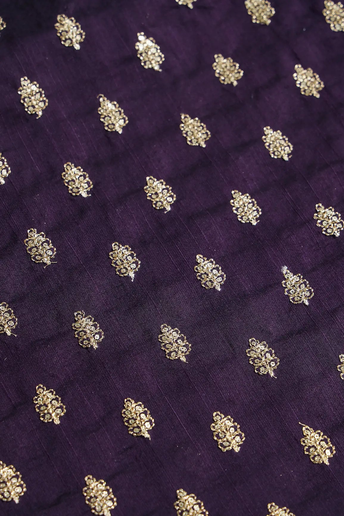 Gold Sequins With Gold Zari Small Motif Embroidery Work On Wine Raw Silk Fabric