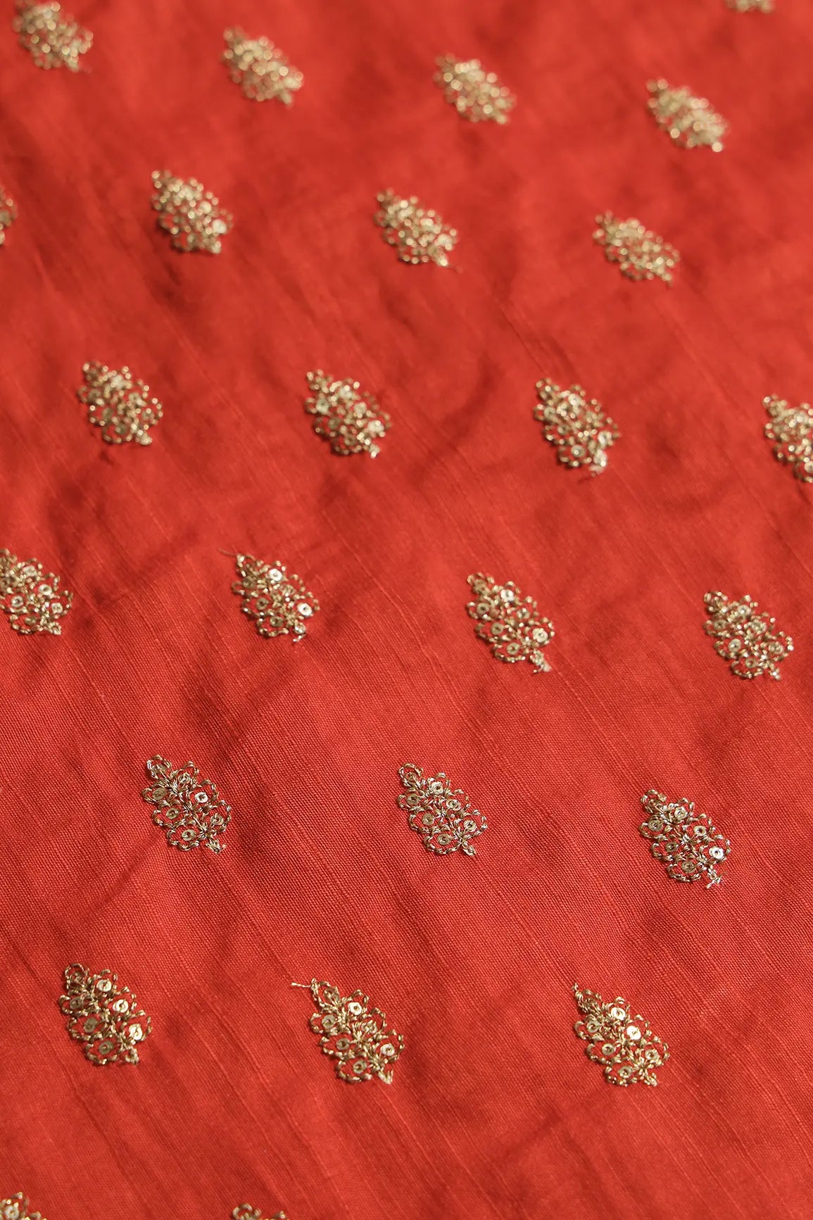 Gold Sequins With Gold Zari Small Motif Embroidery Work On Orange Raw Silk Fabric