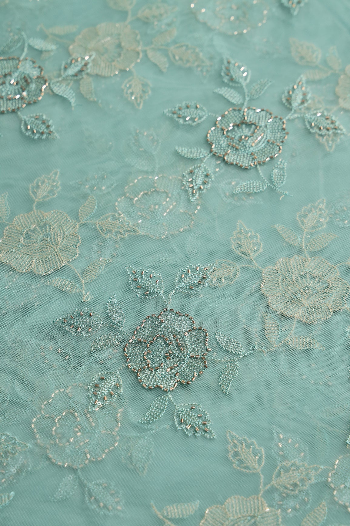Pastel Blue Thread & Beads With Water Sequins Floral Embroidery Work On Pastel Blue Soft Net Fabric