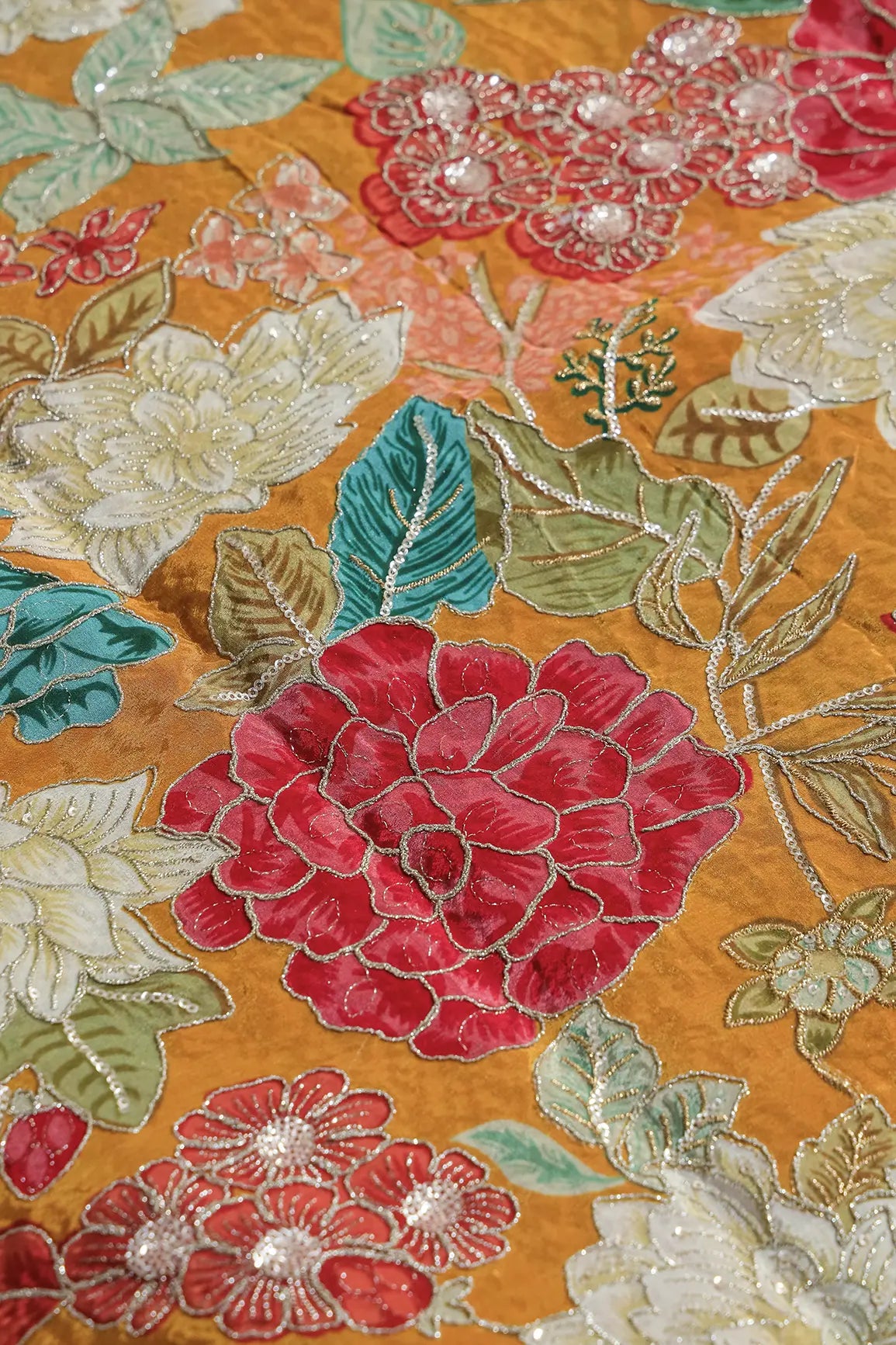 Zari with Sequins Floral Positional Print On Mustard Yellow Pure Crepe Fabric