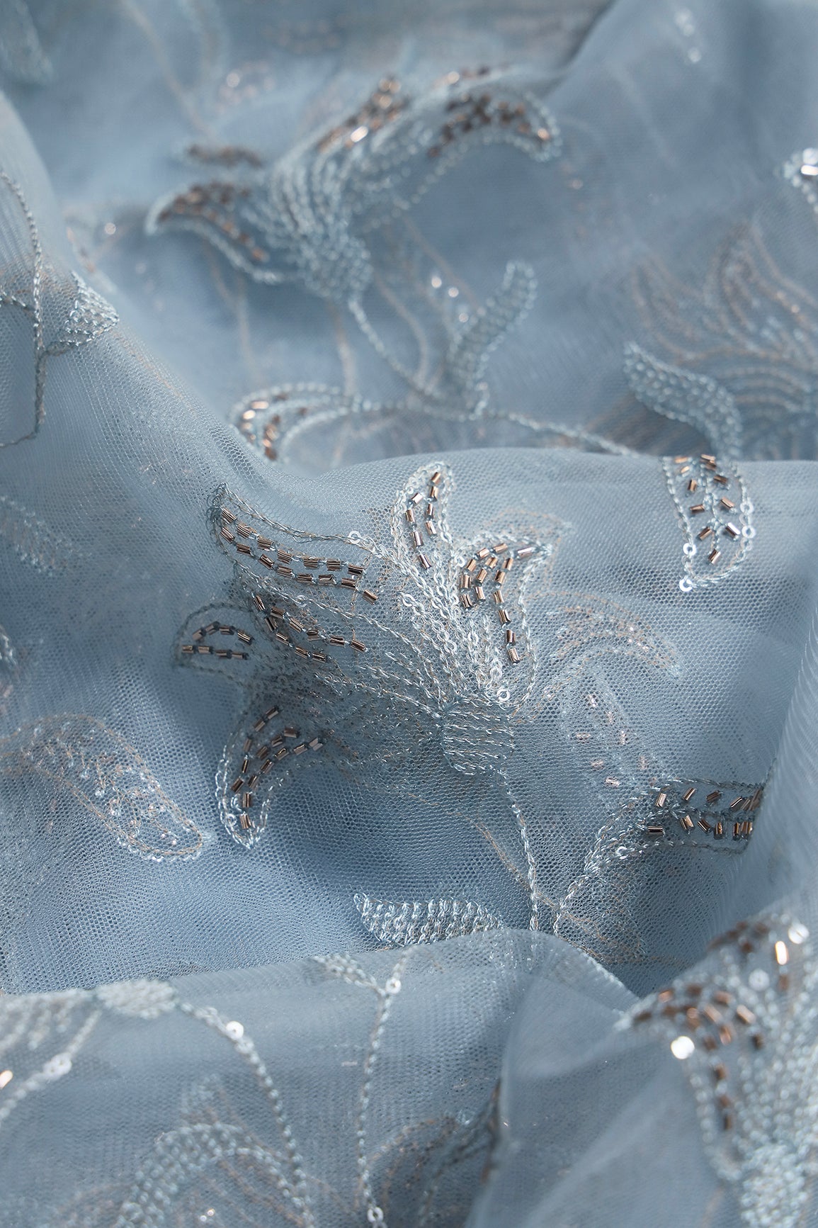 Light Blue Thread & Beads With Water Sequins Floral Leafy Embroidery Work On Light Blue Soft Net Fabric