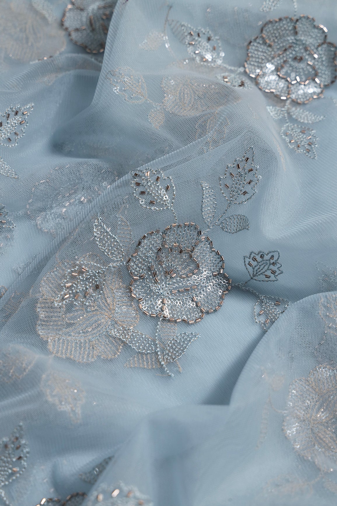 Light Blue Thread & Beads With Water Sequins Floral Embroidery Work On Light Blue Soft Net Fabric