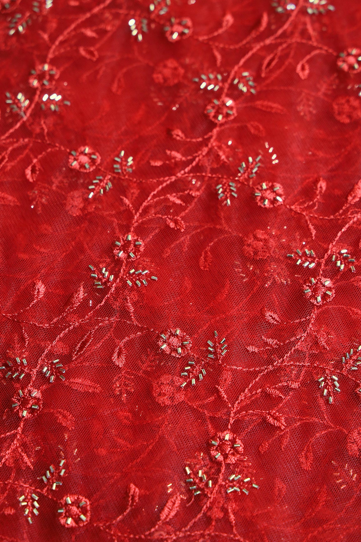 Red Thread With Beads Floral Leafy Embroidery Work On Red Soft Net Fabric
