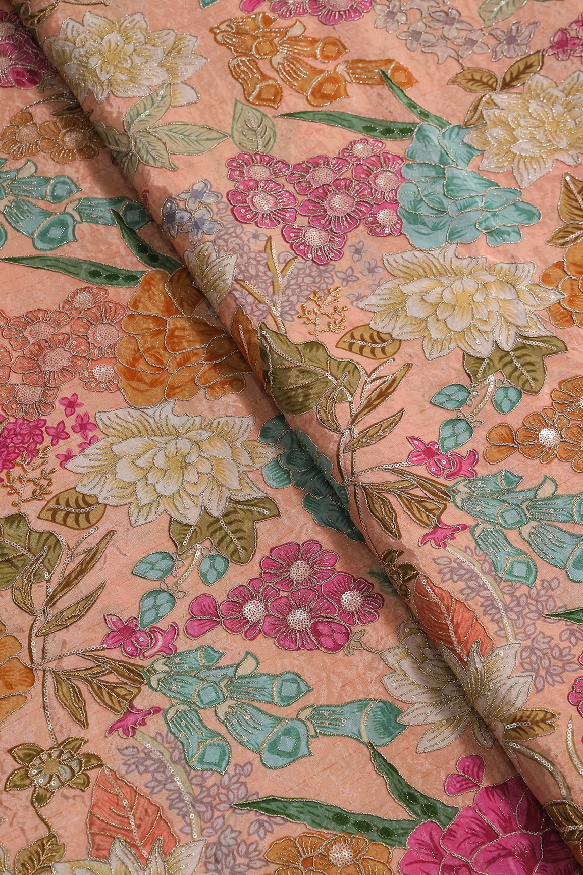 Zari with Sequins Floral Positional Print On Peach Pure Crepe Fabric