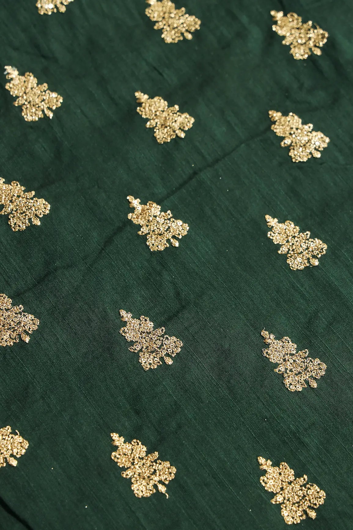 Gold Sequins With Gold Zari Big Motif Embroidery Work On Bottle Green Raw Silk Fabric