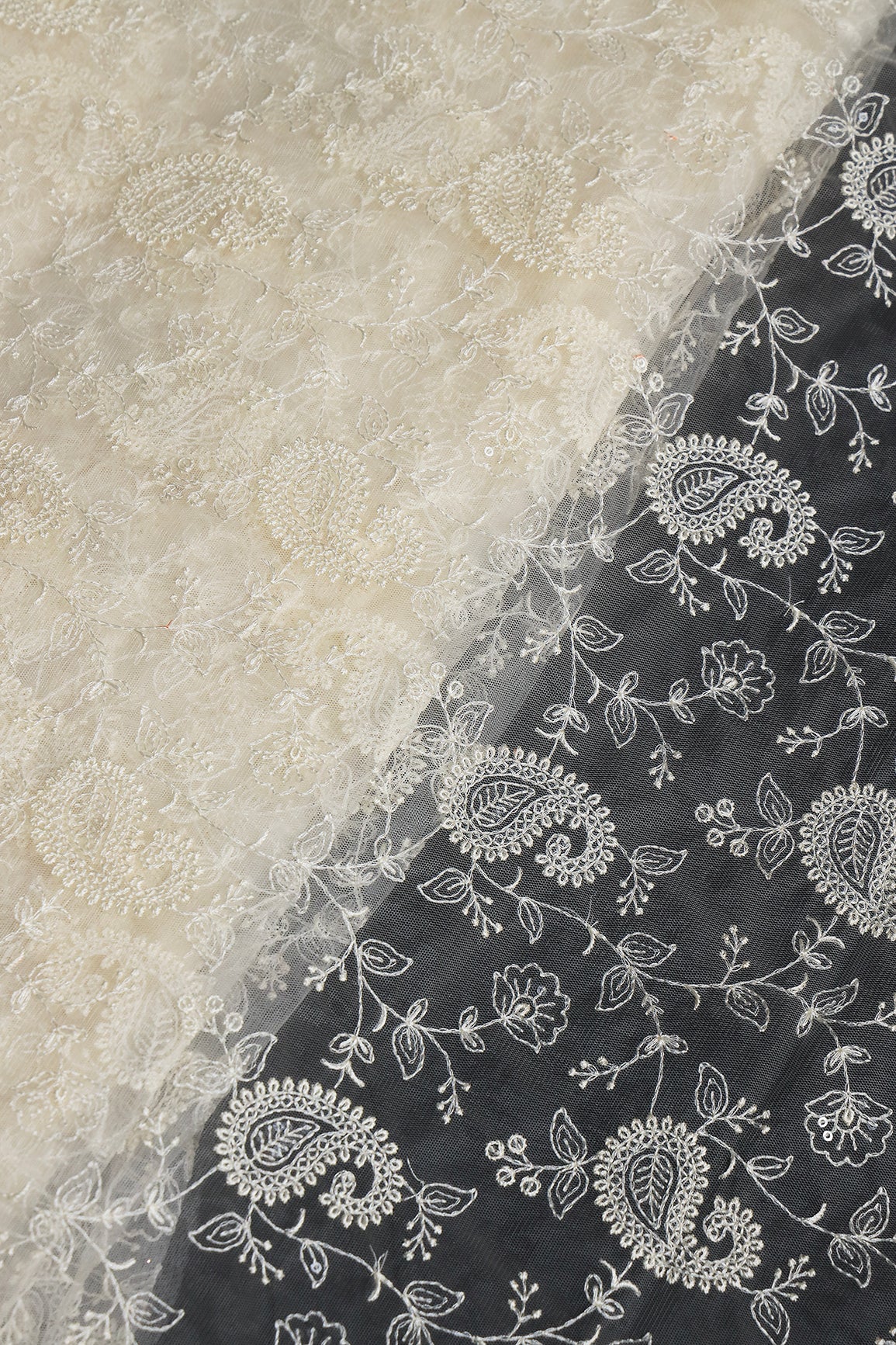 Cream Thread With Water Sequins Floral Paisley Embroidery Work On Cream Soft Net Fabric