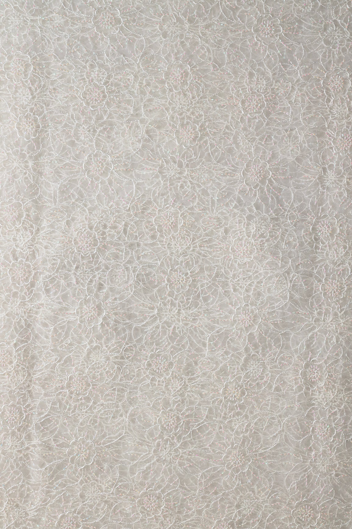 White Thread With Beads Floral Embroidery Work On White Dyeable Soft Net Fabric