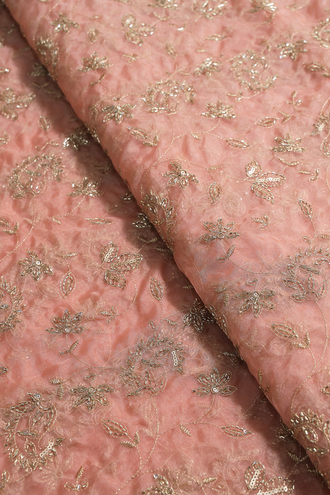 Gold Sequins & Beads With Zari Floral Leafy Paisley Embroidery Work On Peach Organza Fabric