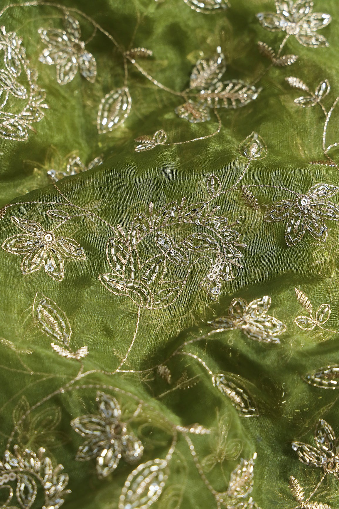 Gold Sequins & Beads With Zari Floral Leafy Paisley Embroidery Work On Green Organza Fabric